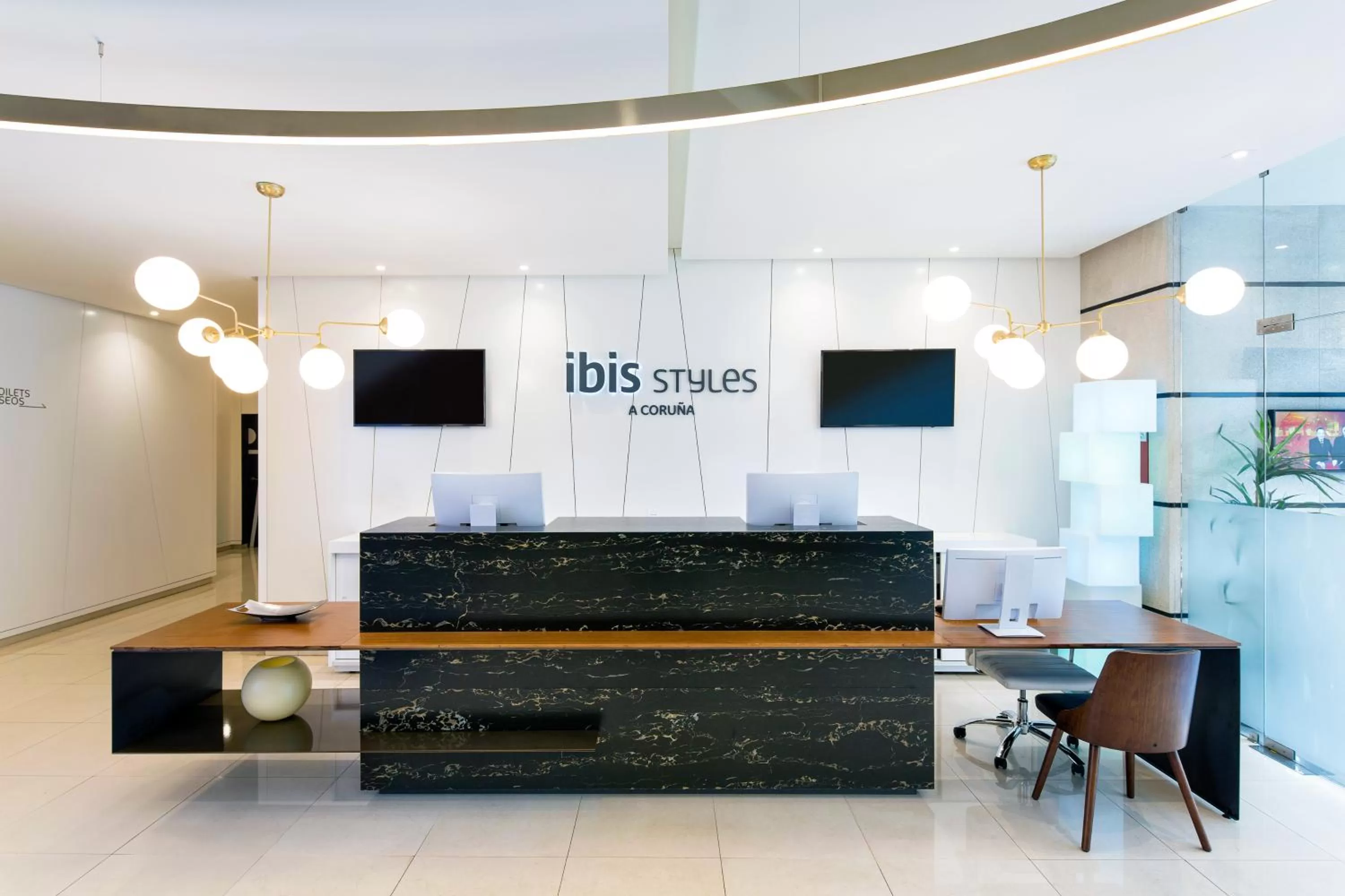 Lobby or reception in Ibis Styles A Coruna