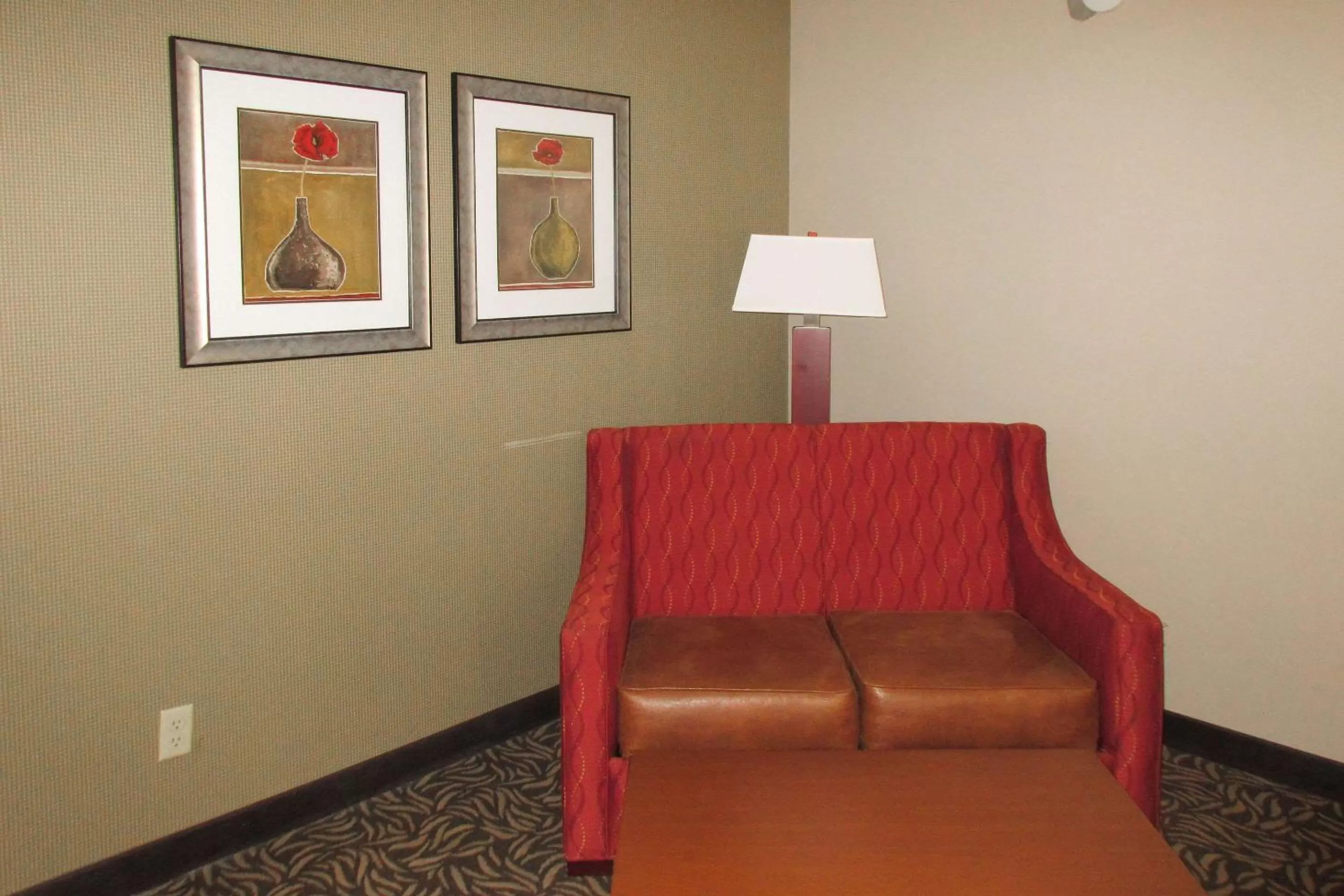 Photo of the whole room in Clarion Inn & Suites Cortland - University Area