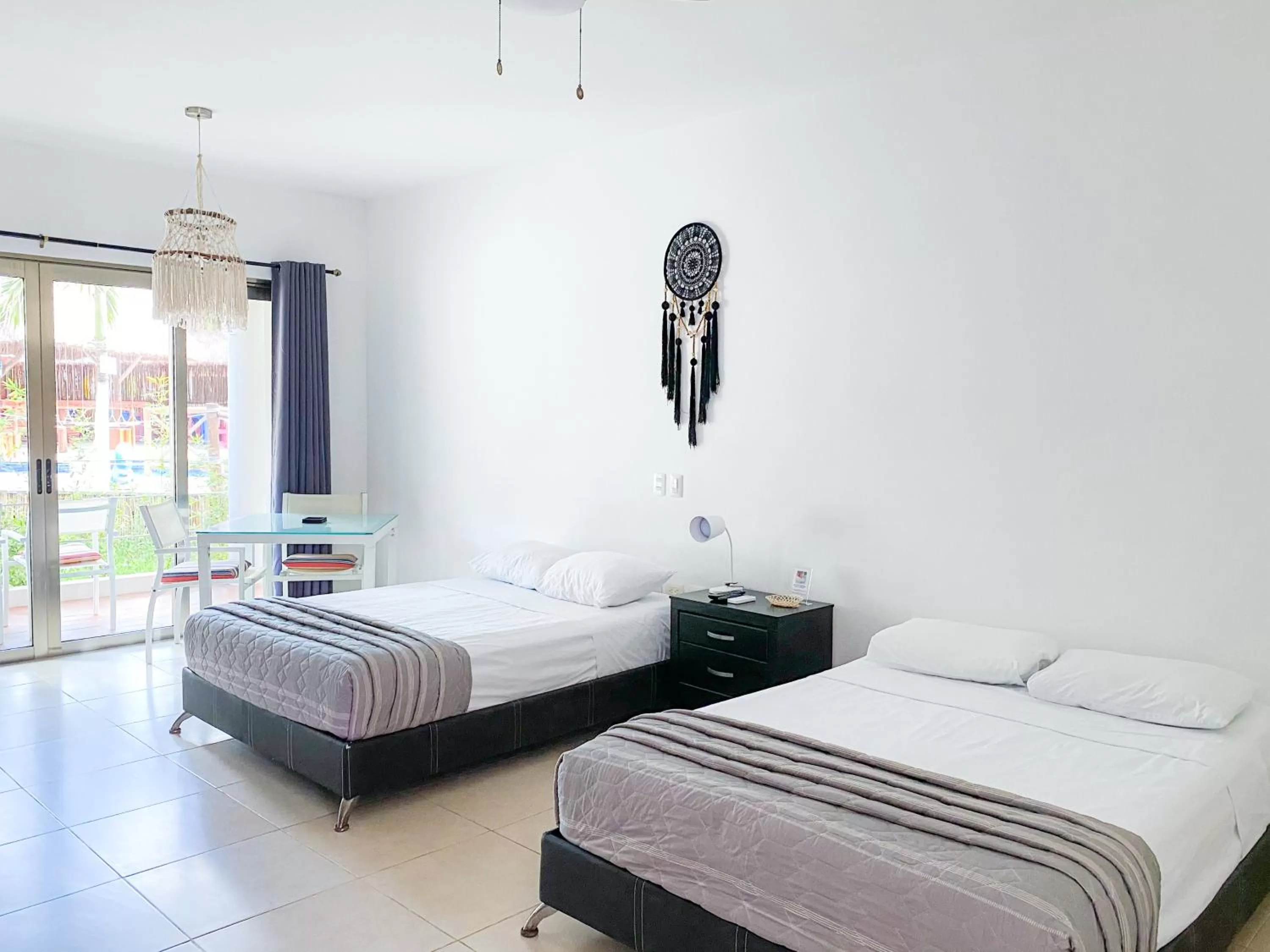 Bed in Maia Suites Cozumel