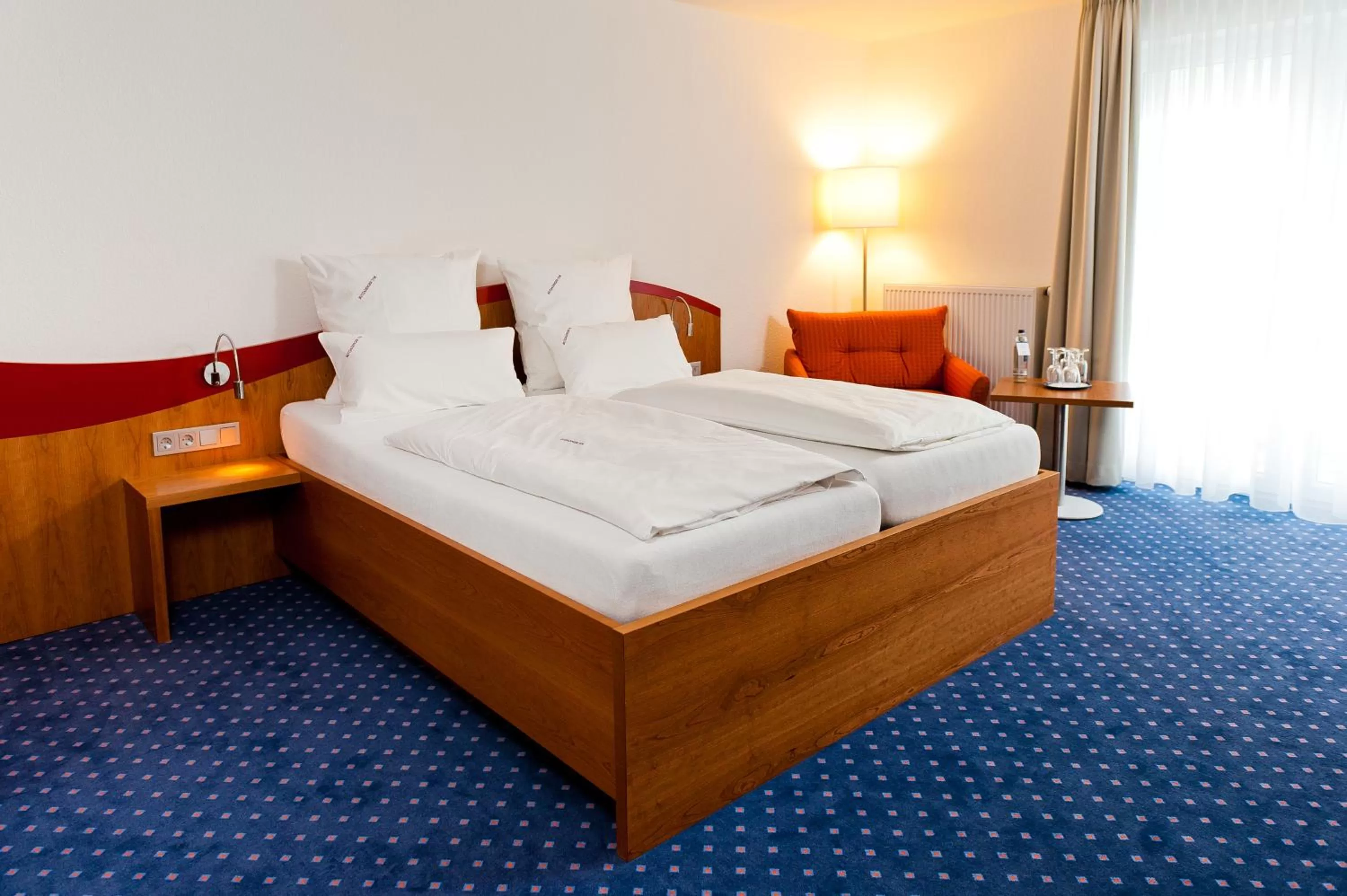 Bed in Komforthotel Butjadinger Tor