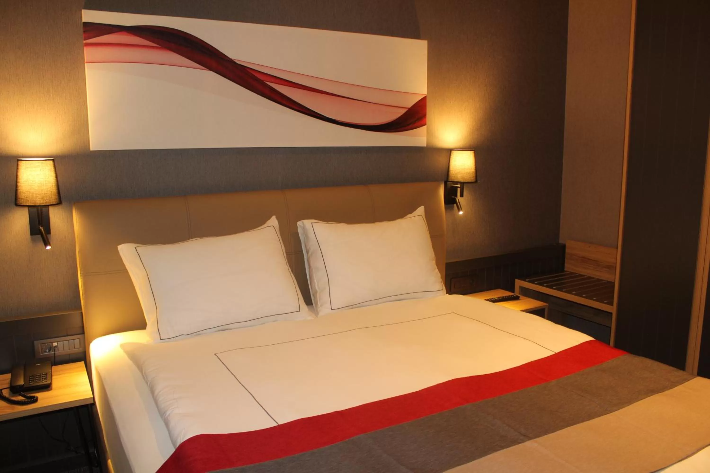 Bed in Ramada By Wyndham Tire