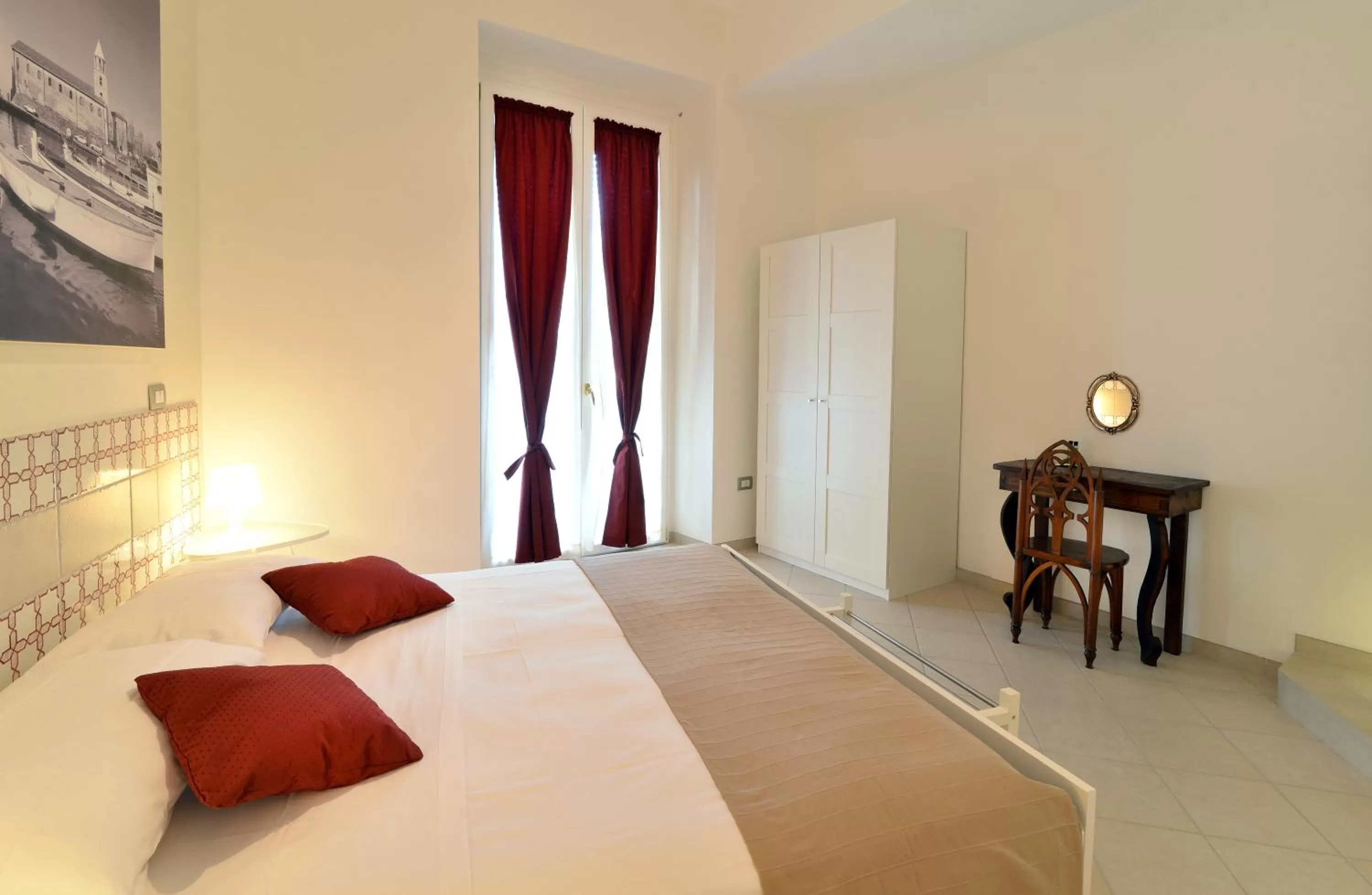 Bed in Santi e Saraceni Rooms