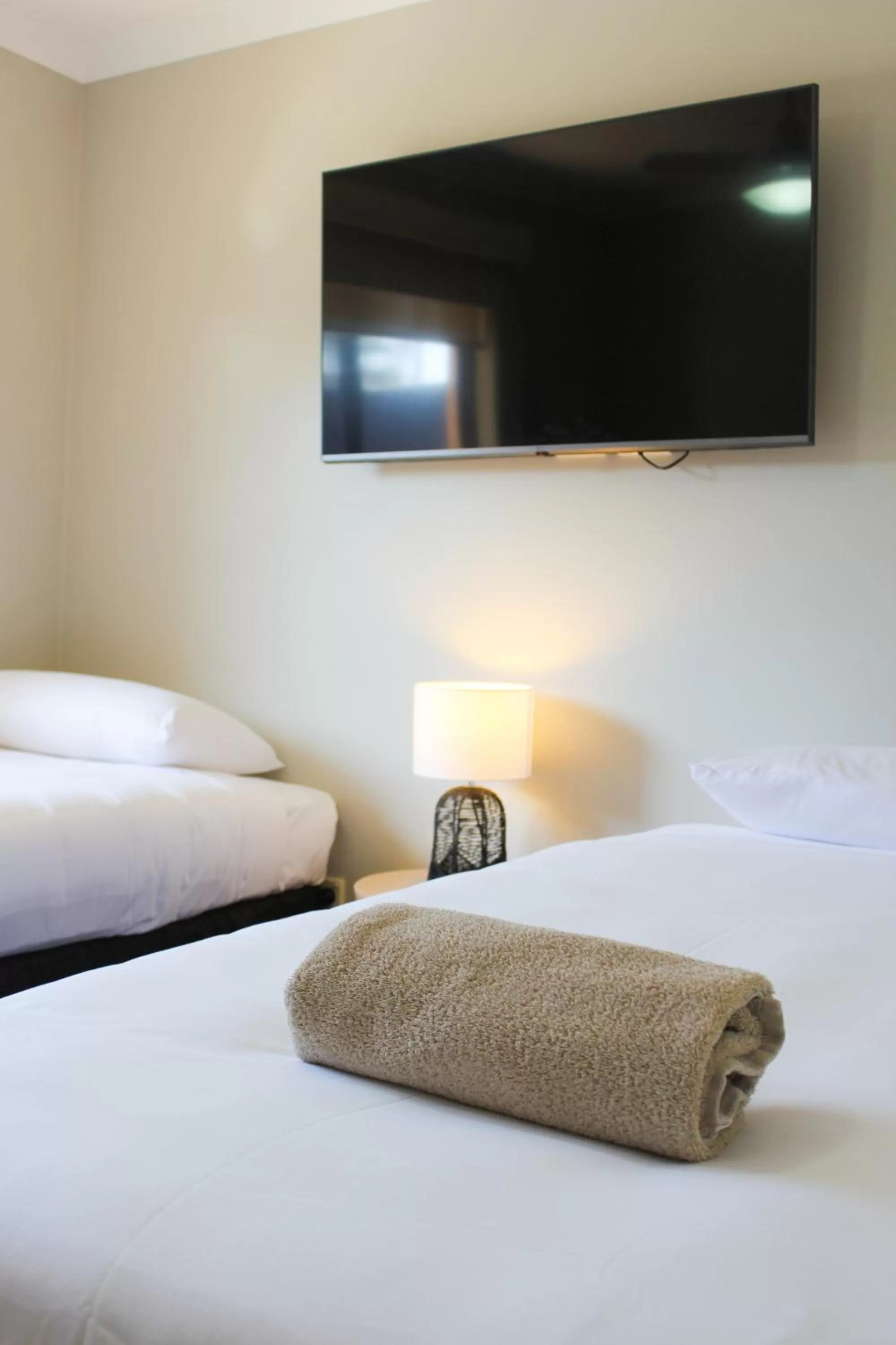 Bed in Yamba Twin Pines Motel