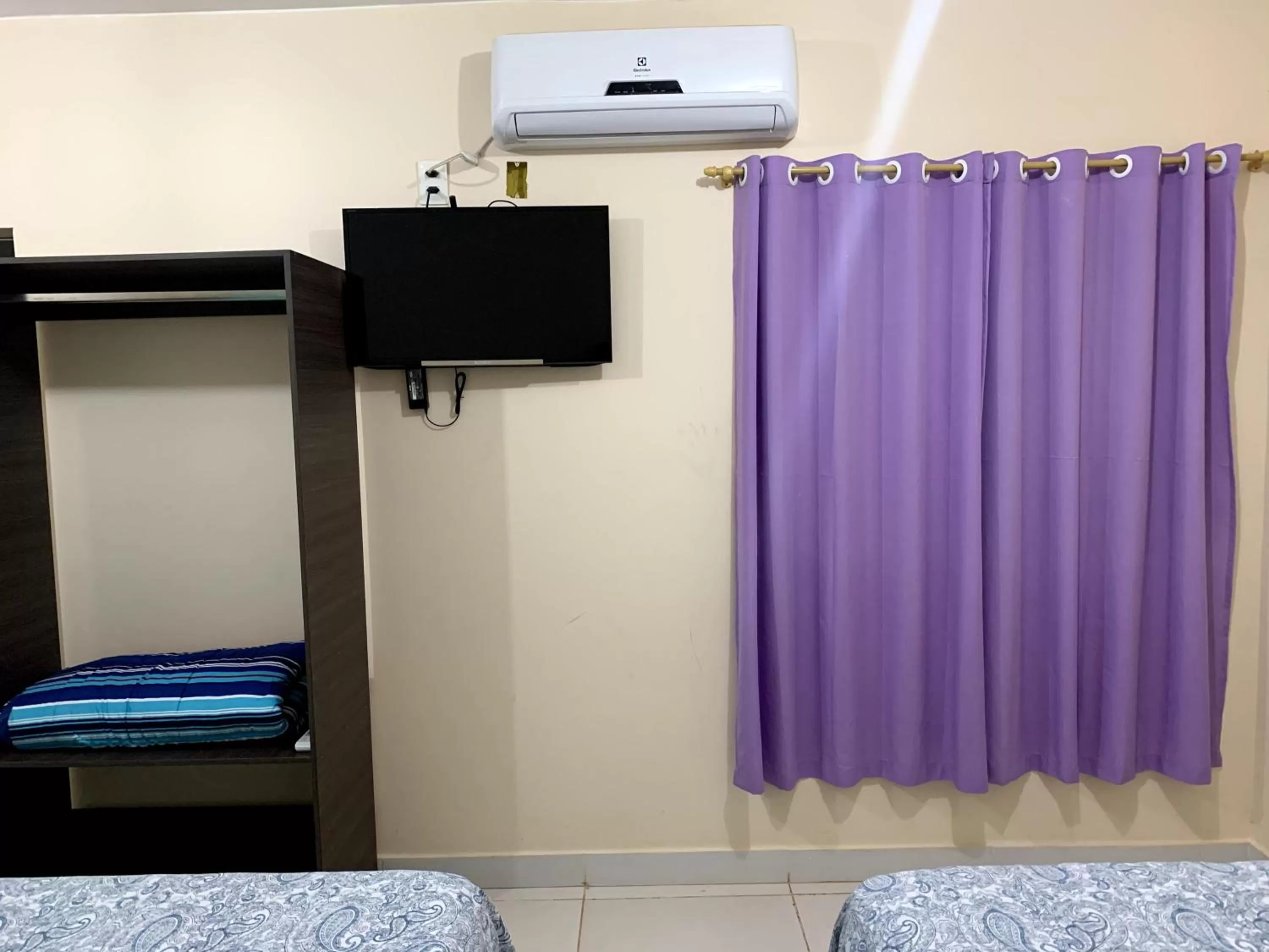 TV/Entertainment Center in Pousada Jardim Brasília