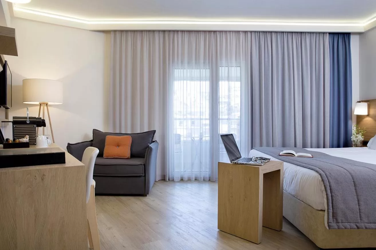 Bed in Golden Age Athens Hotel