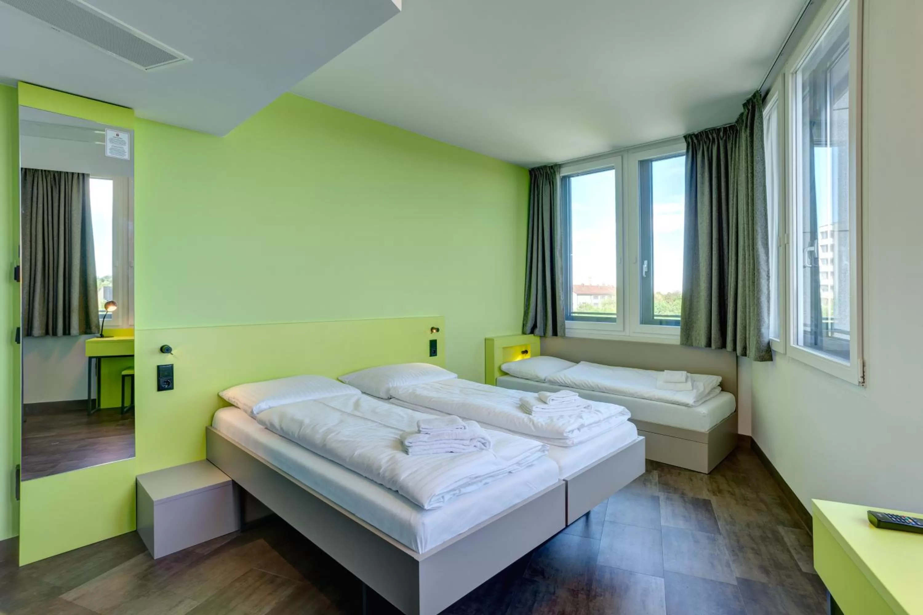 Photo of the whole room, Bed in MEININGER Hotel München Olympiapark