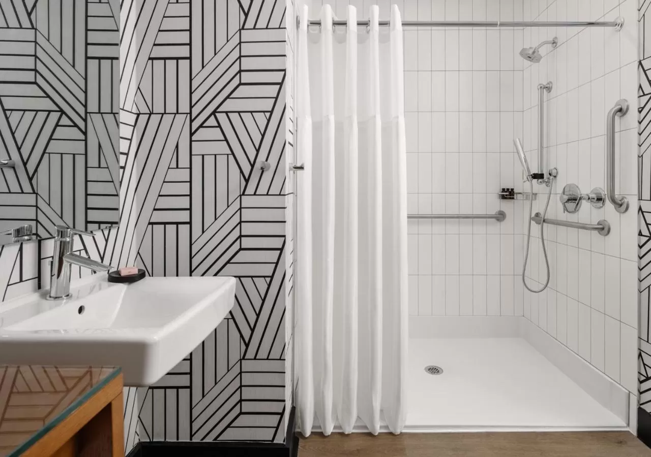 Shower in Hotel Tupelo, a Wyndham Hotel