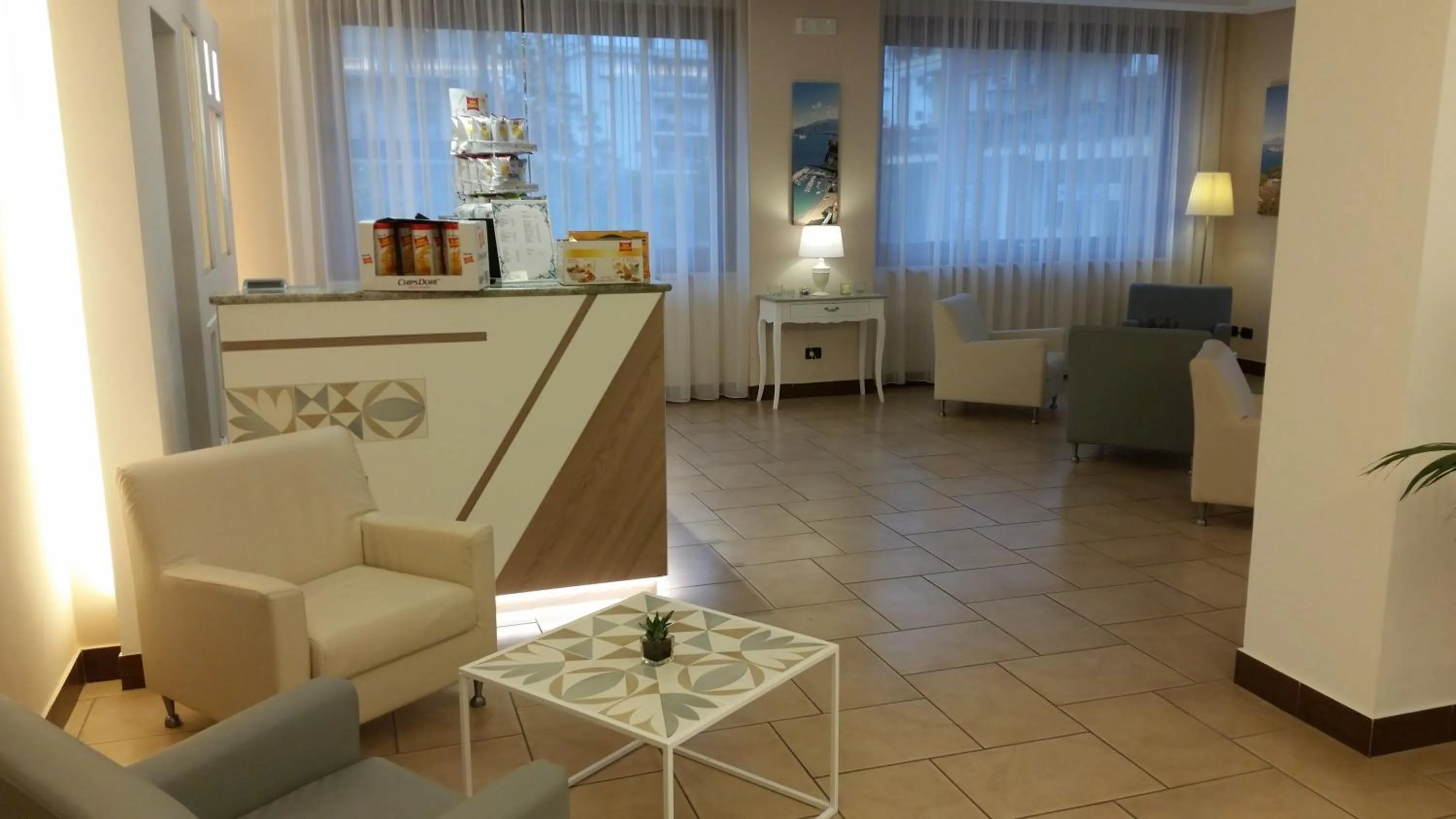 Communal lounge/ TV room in Hotel Leone