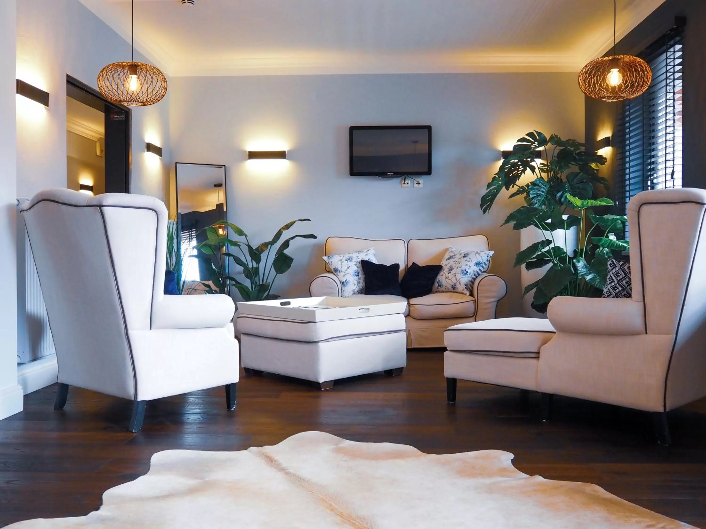 Living room, Seating Area in Sauna & Whirlpool - ALPENLIEBE APARTments