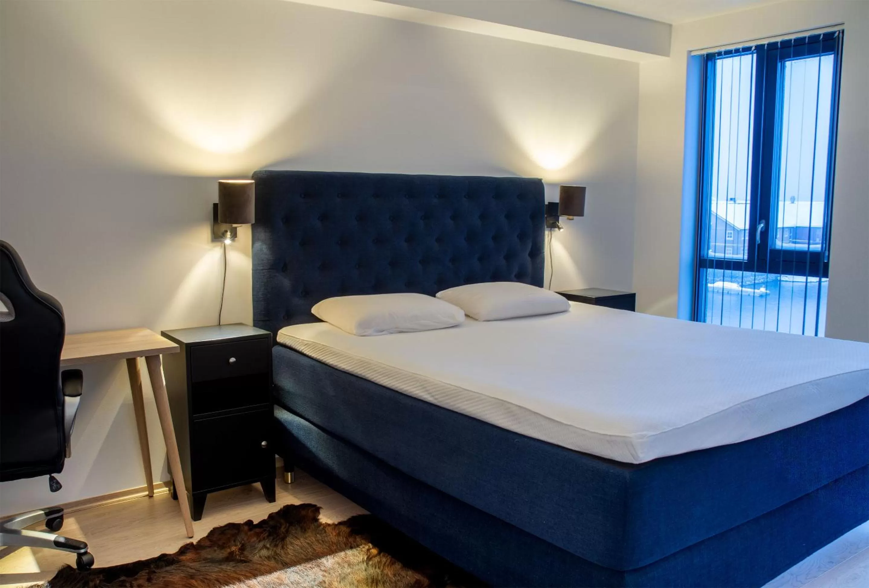 Bed in Nordis Apartments