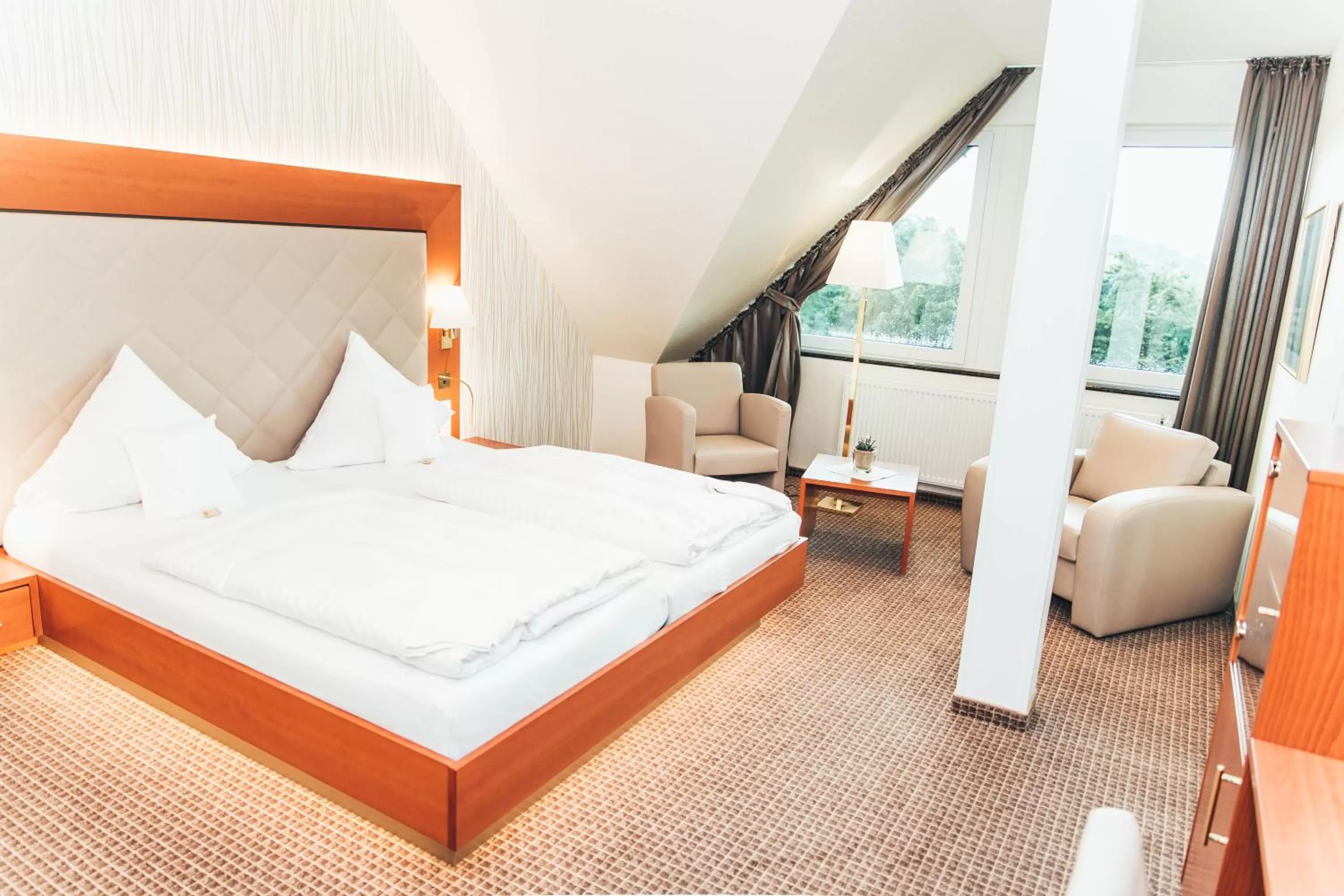 Photo of the whole room, Bed in Ringhotel Teutoburger Wald