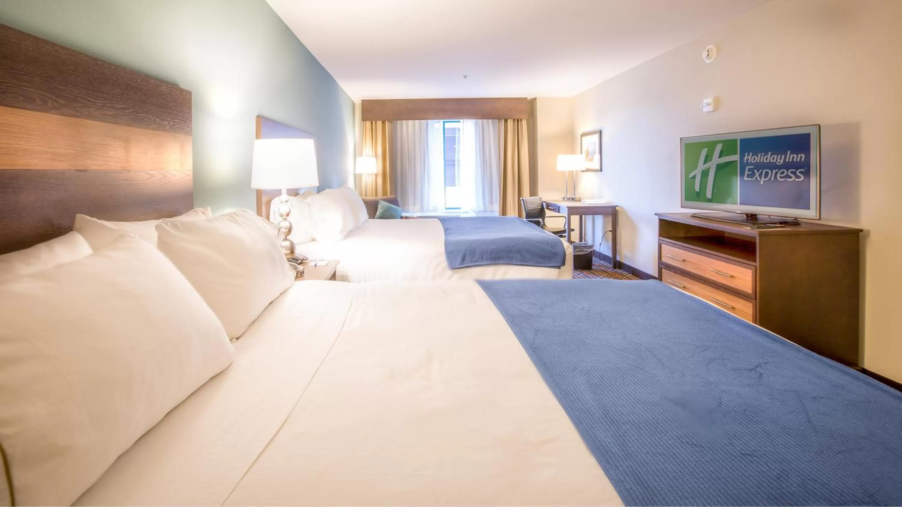 Queen Room with Two Queen Beds - Hearing Accessible in Holiday Inn Express Wichita South, an IHG Hotel