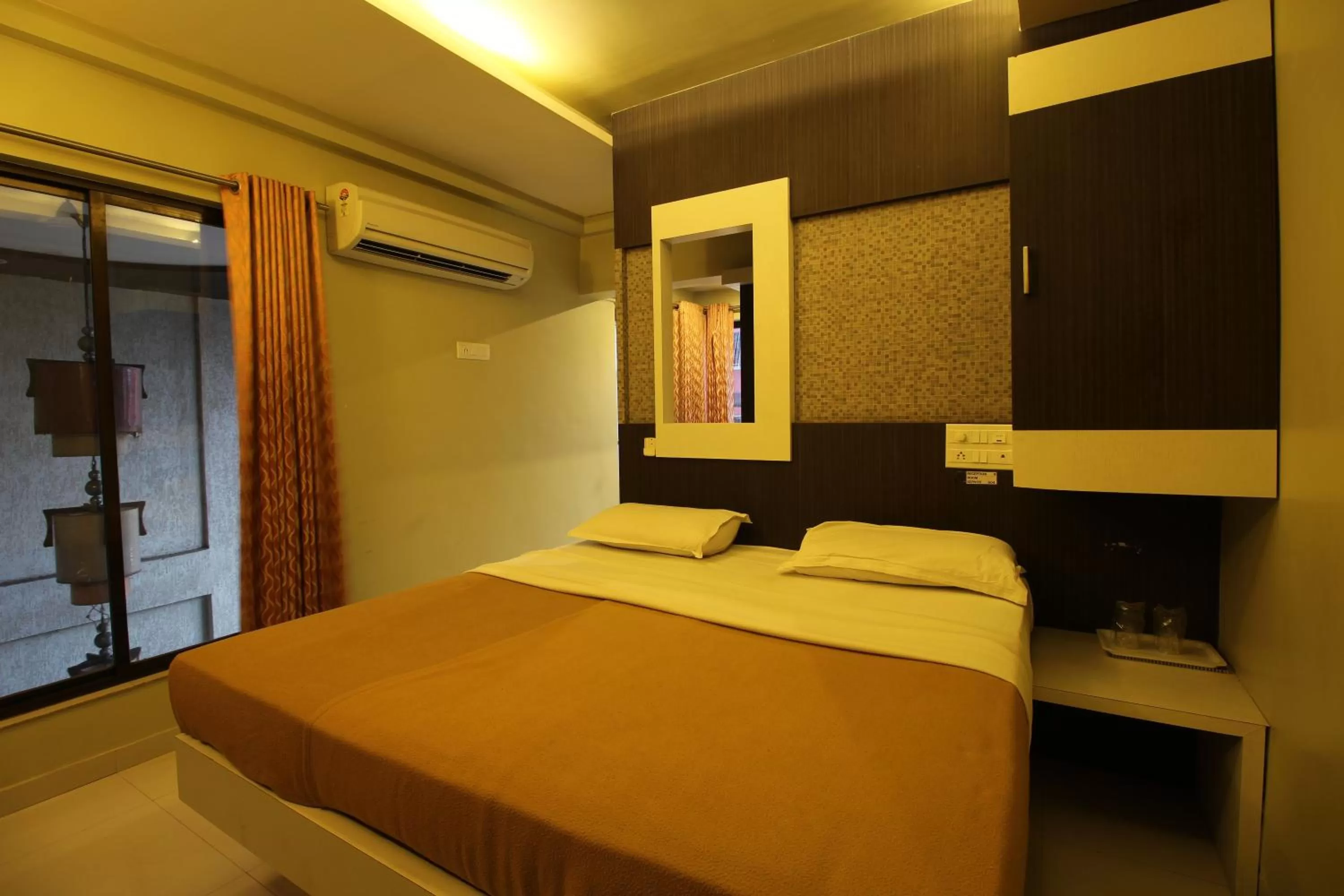 Bedroom in Hotel Sham Suman, Kolhapur- Opposite To Mahalaxmi Temple