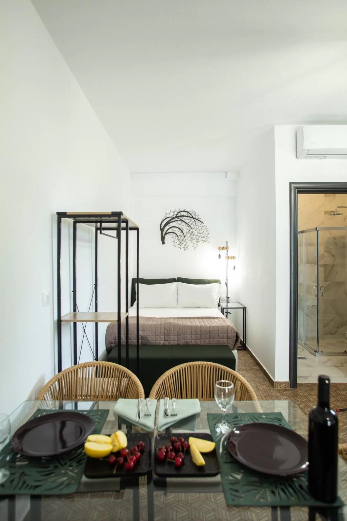 Bed in Anemos Luxury Apartments