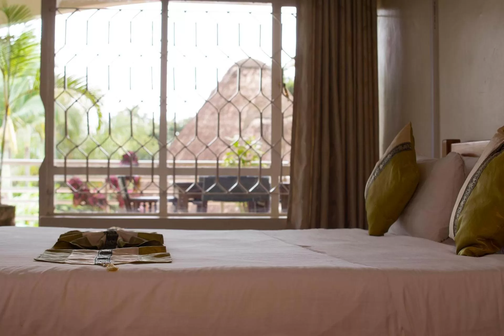 Bed in Entebbe Palm Hotel