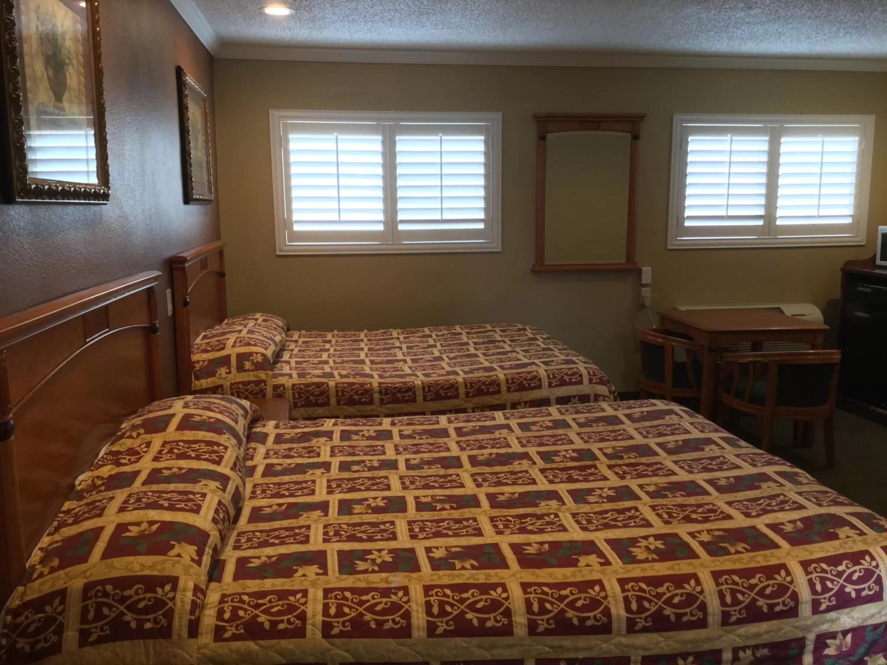 Bed in Bevonshire Lodge Motel