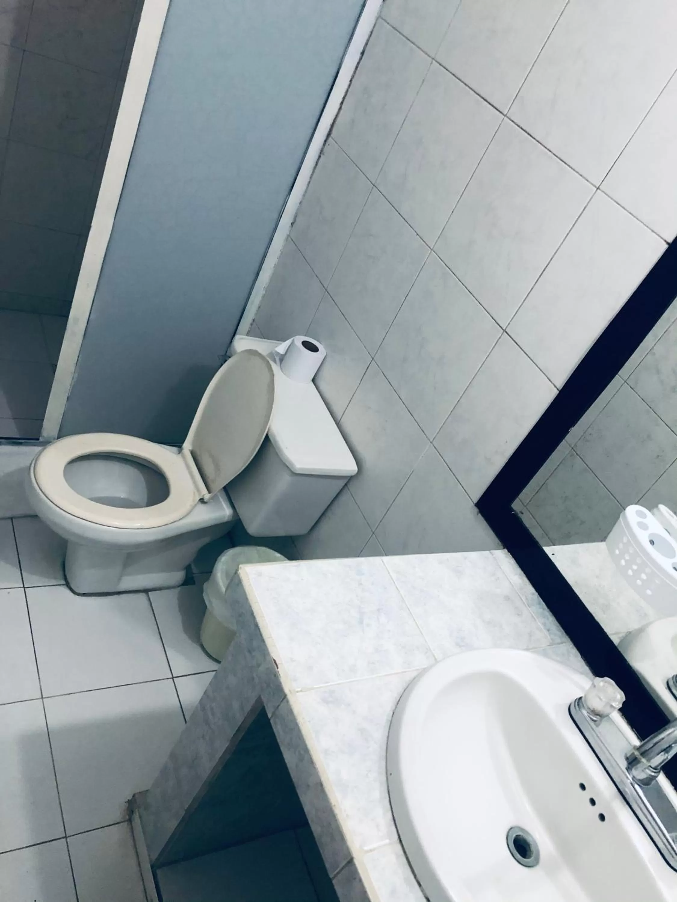 Bathroom in Tita’s Airport Hotel