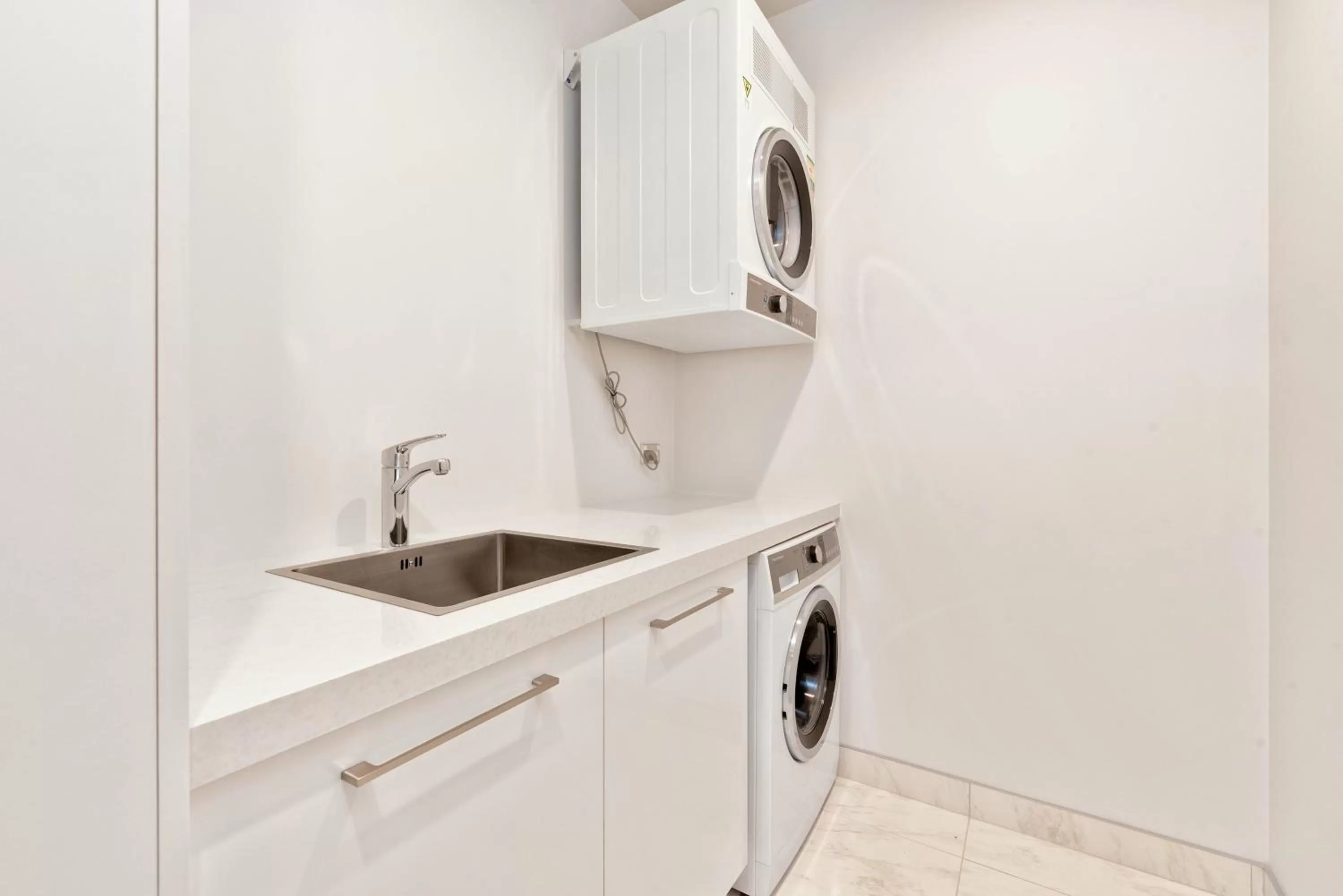 laundry in The Rees Hotel & Luxury Apartments