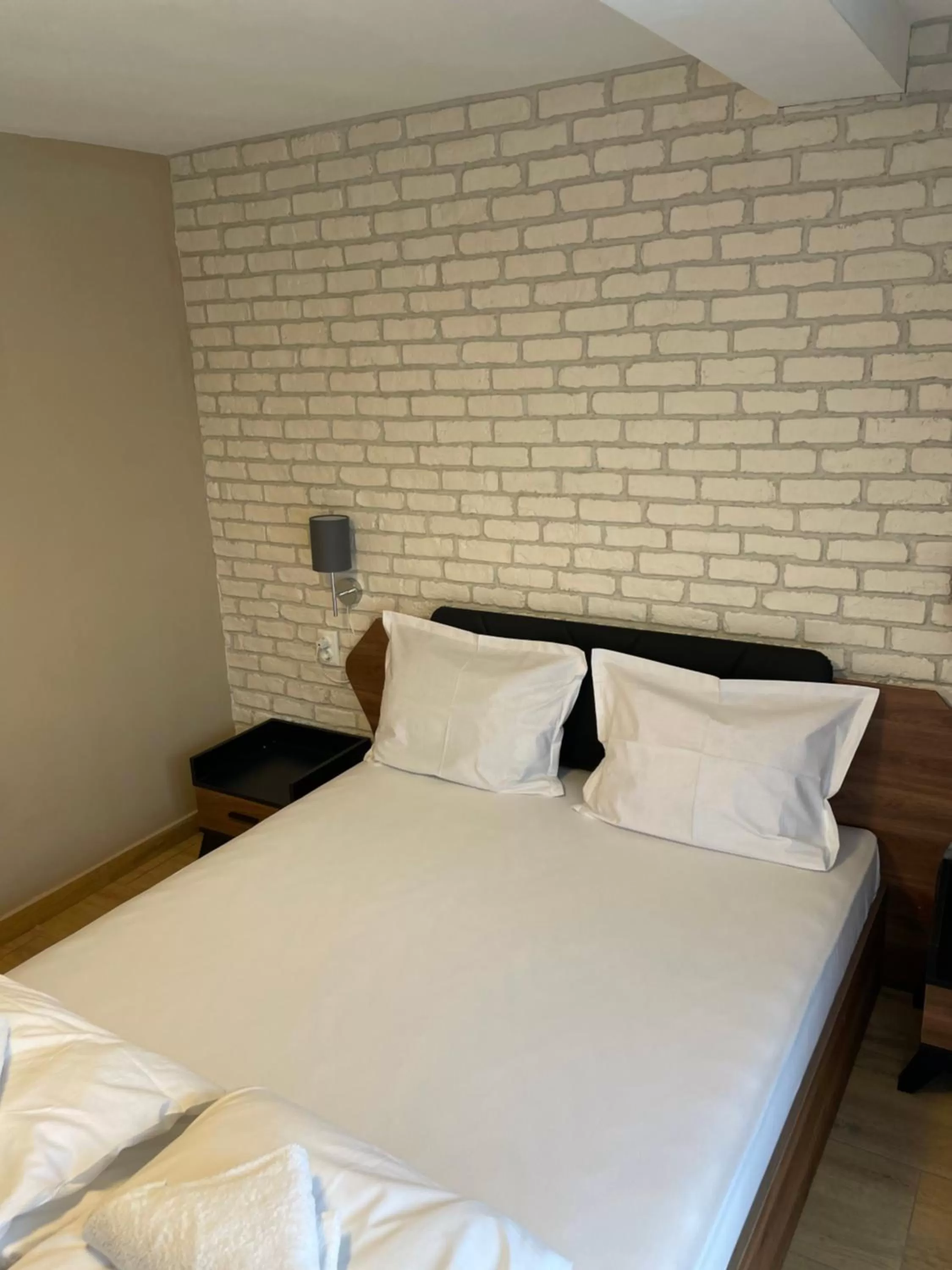 Bed in Family Hotel Malibu