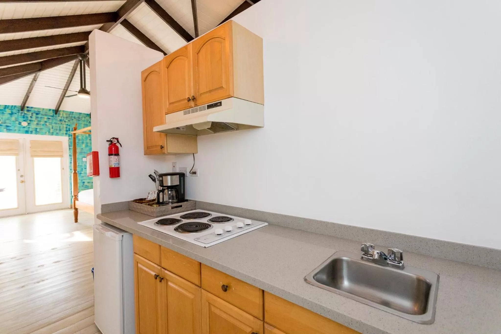 Kitchen or kitchenette in True Blue Bay Resort