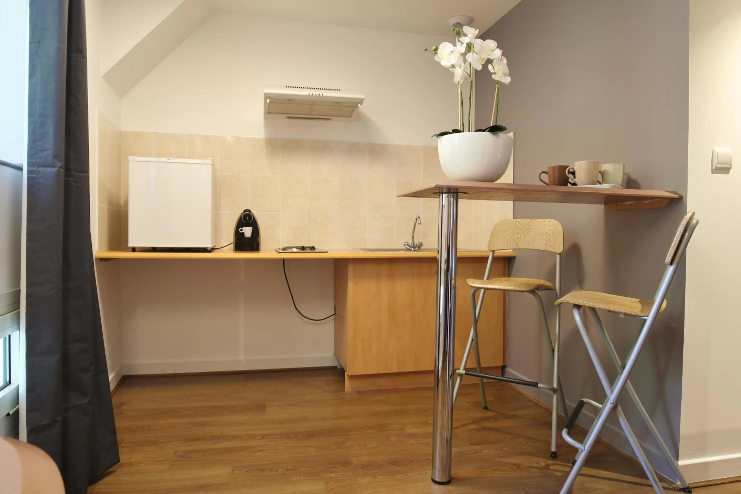 Kitchen or kitchenette in Best Western Le Pont d'Or