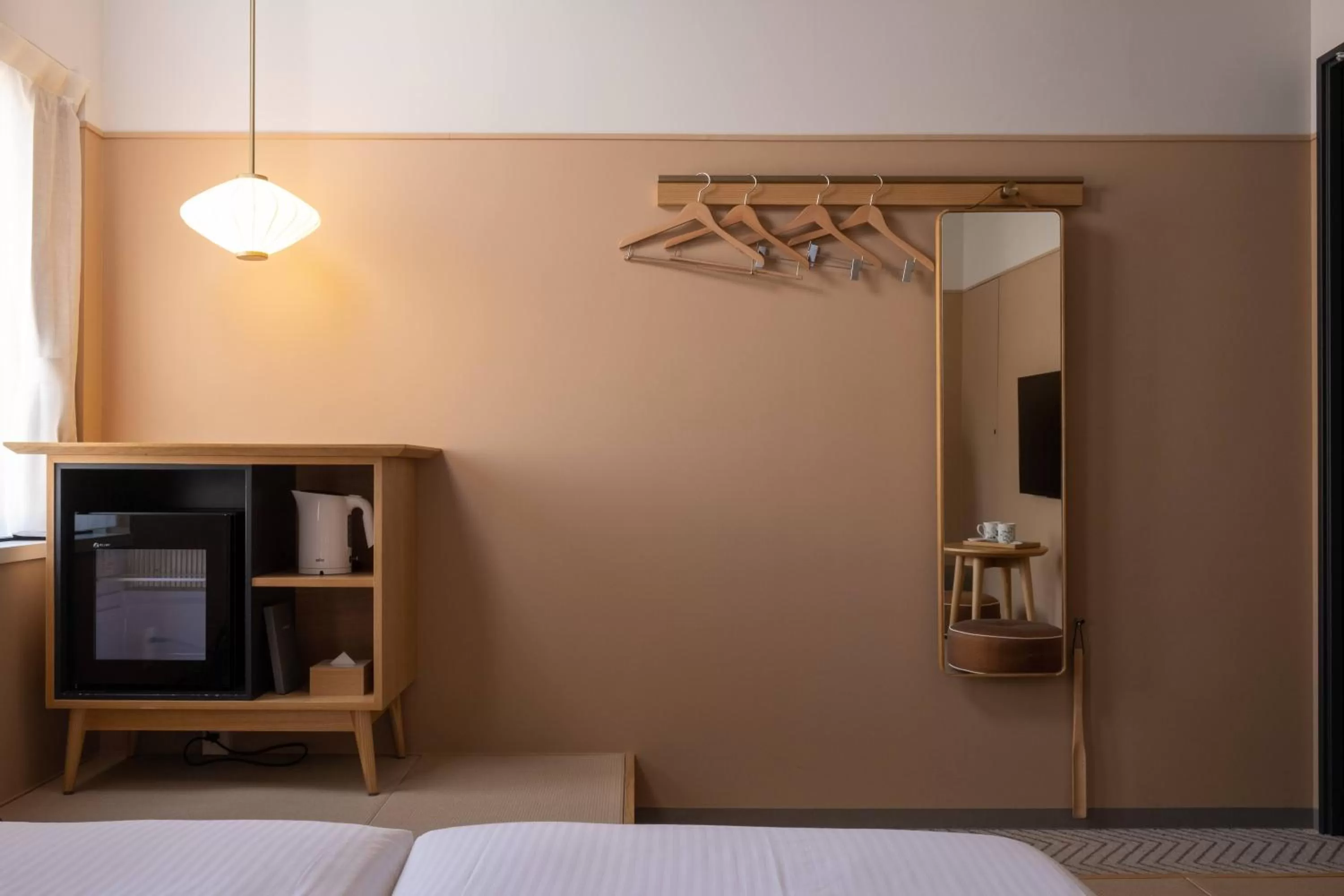 Photo of the whole room, Bed in RAKURO Kyoto by THE SHARE HOTELS