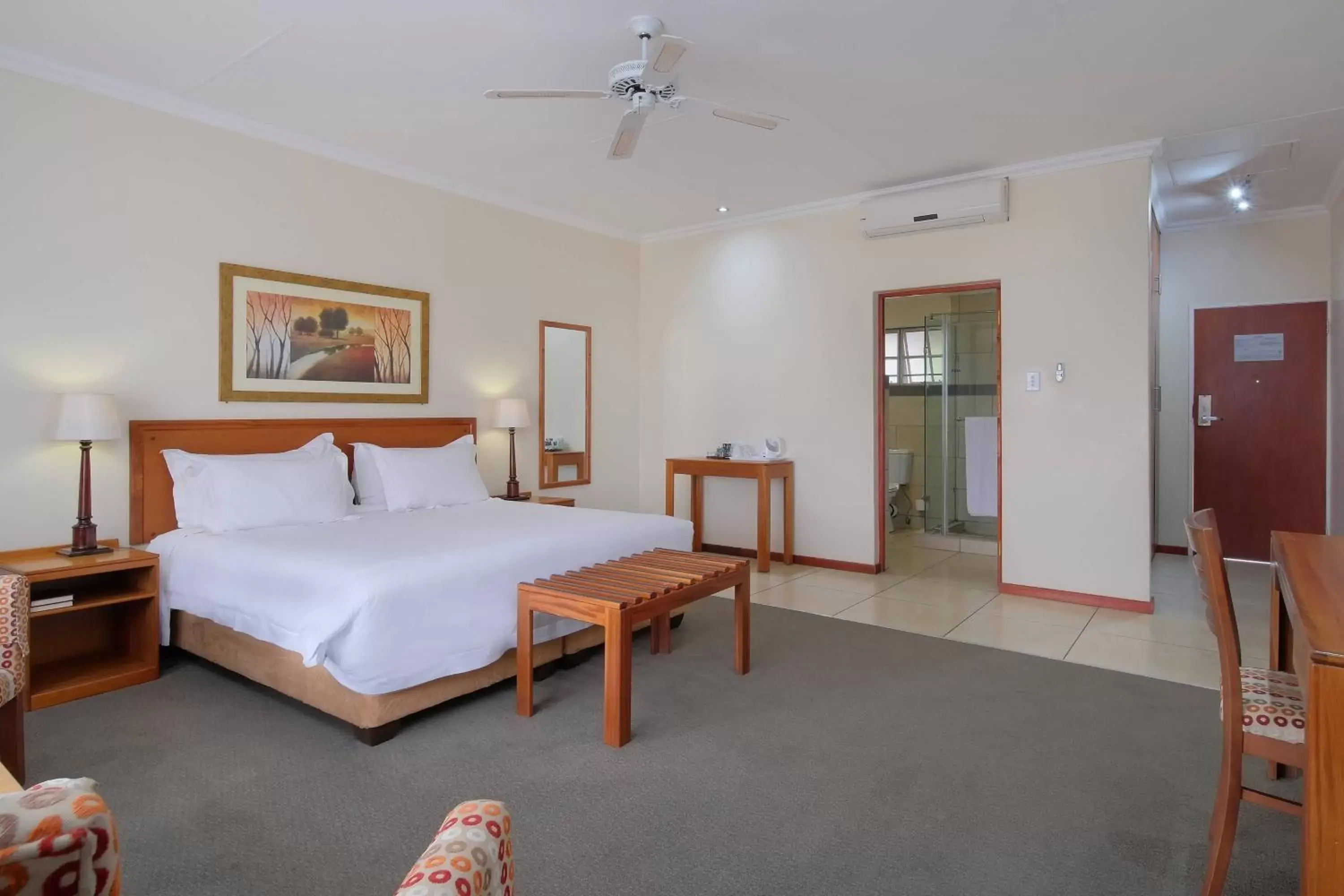 Larger Guest room, 1 King, Garden view - single occupancy in Protea Hotel by Marriott Polokwane Ranch Resort Larger Guest room, 1 King, Garden view - single occupancy in Protea Hotel by Marriott Polokwane Ranch Resort