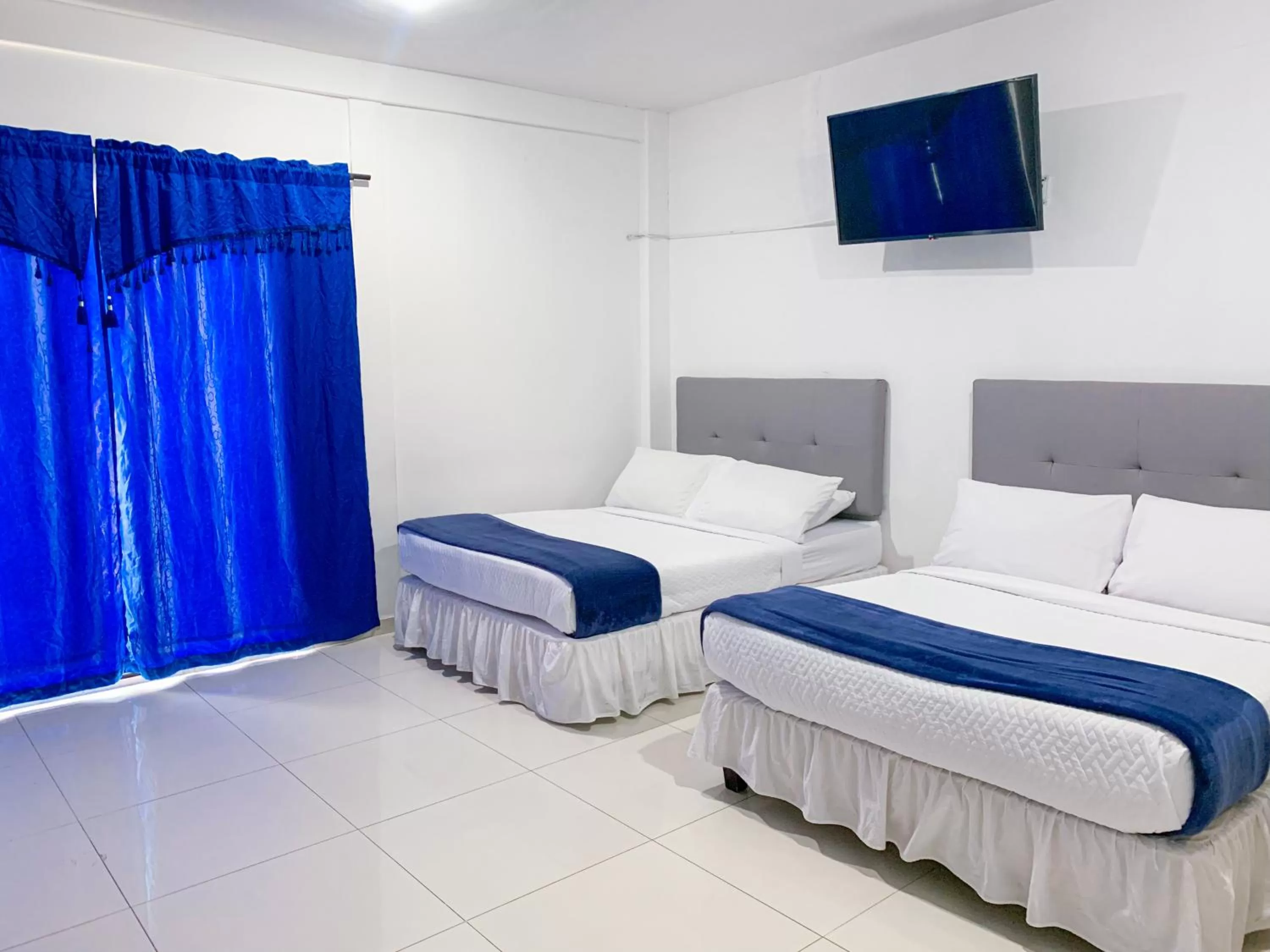 Bed in Hotel Abi Inn By GEH Suites