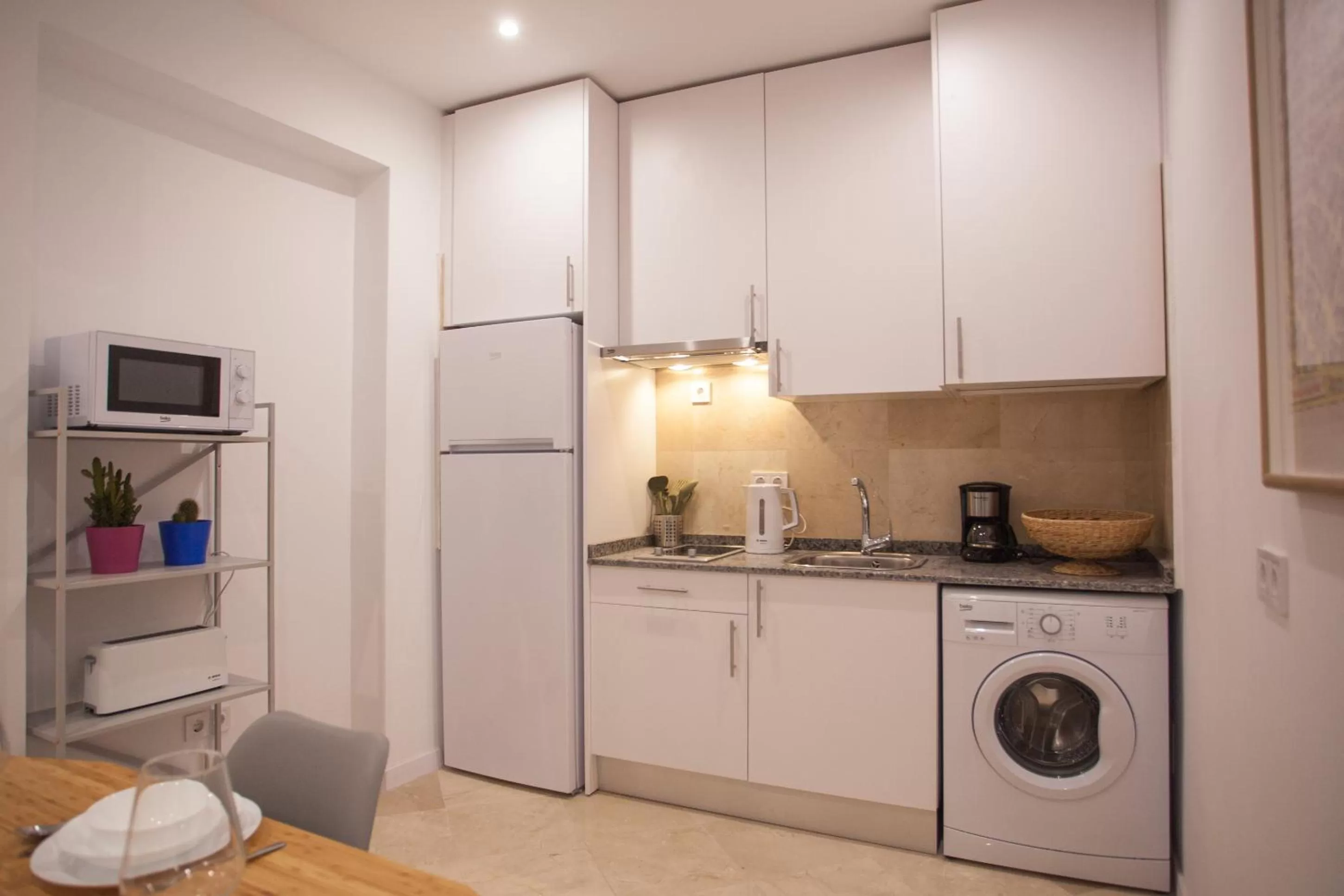 Kitchen or kitchenette in Gran Central Suites