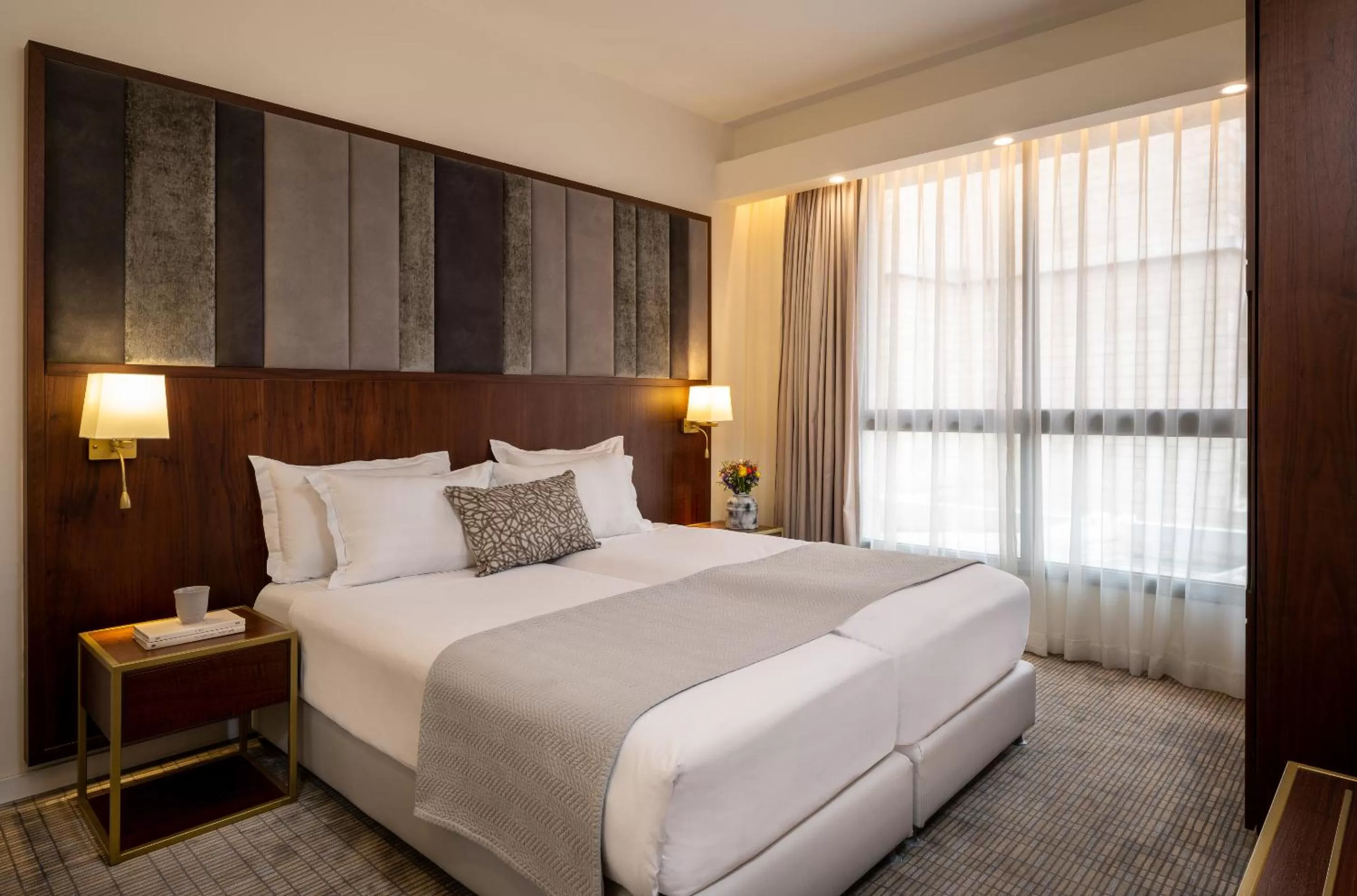 Bed in Olive Tree Hotel