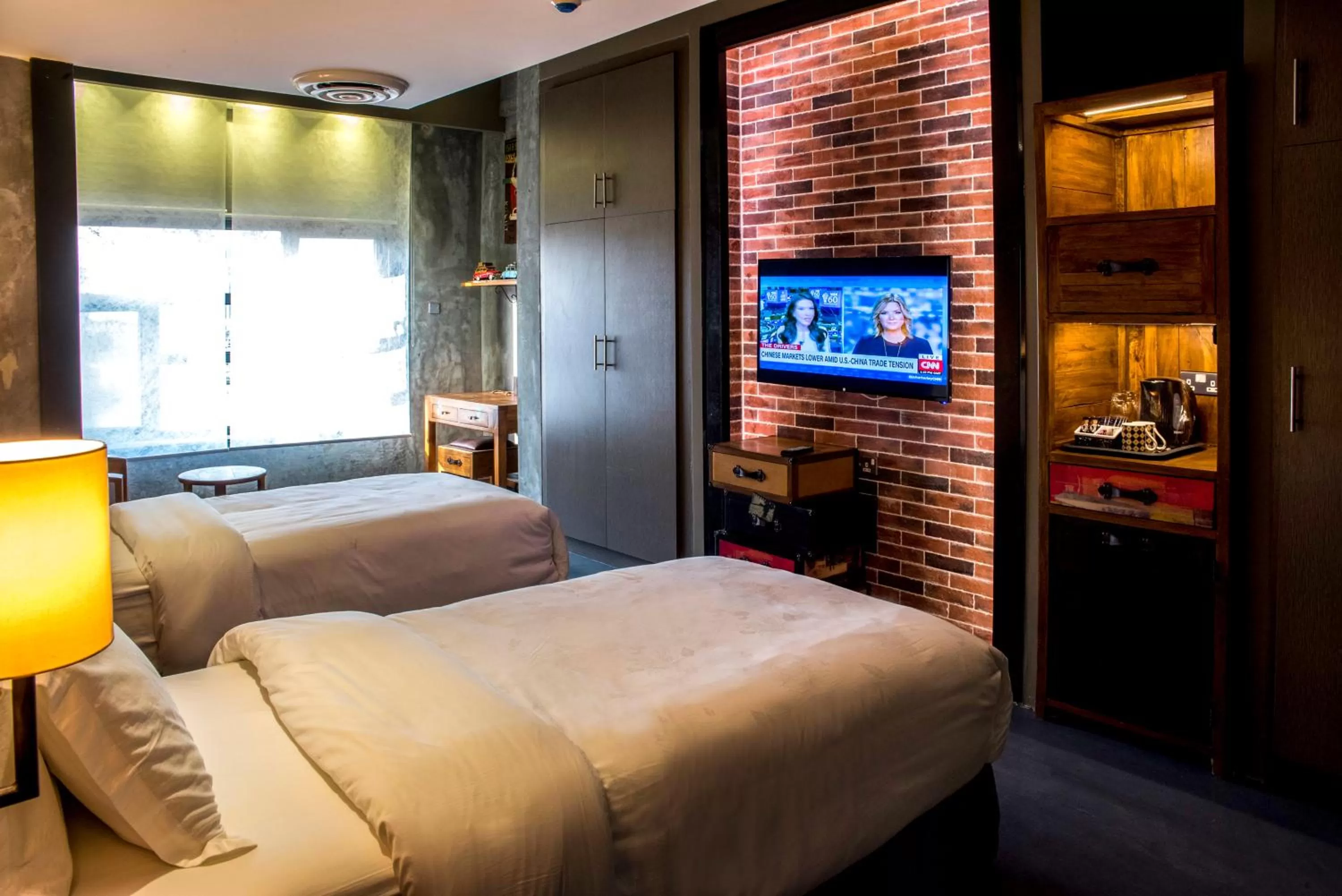 Bed in Flowery Holiday Suites