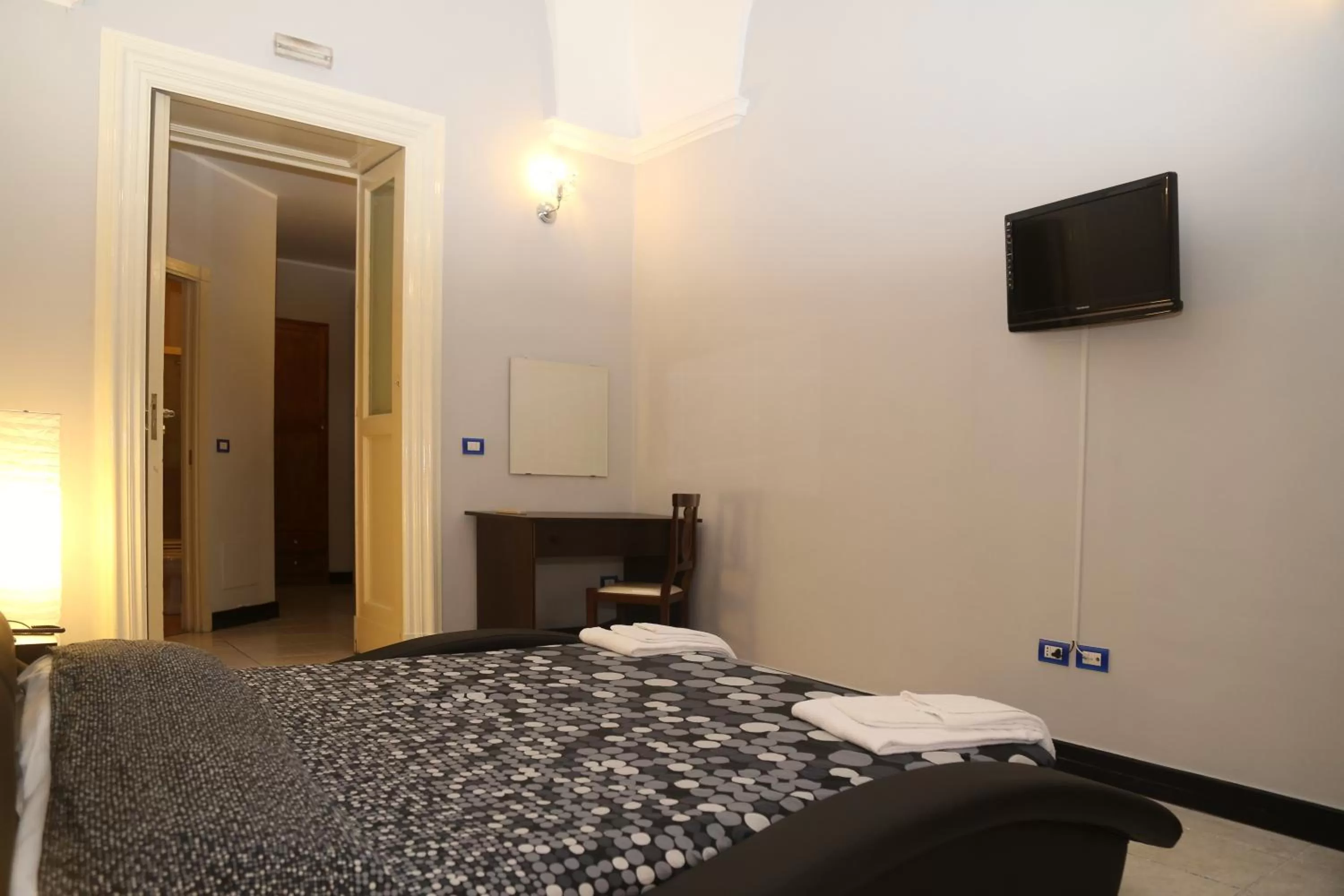 Photo of the whole room, Bed in Hotel Sangiuliano 132 centro storico Catania