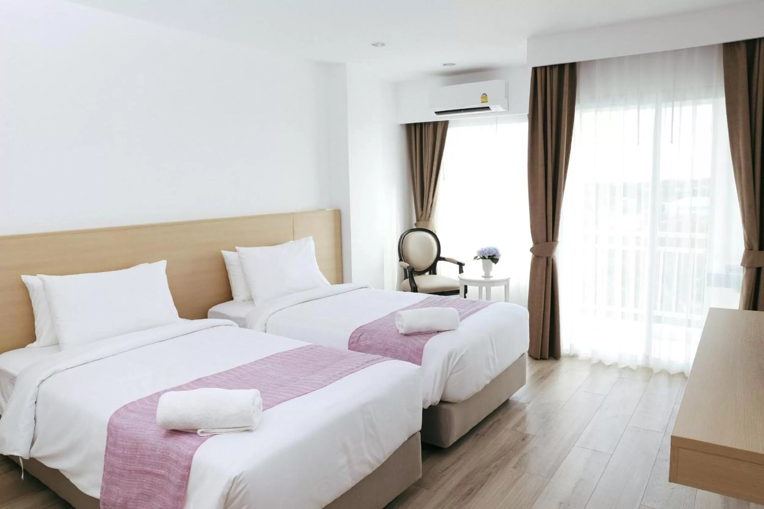 Bed in Arsh Boutique Hotel