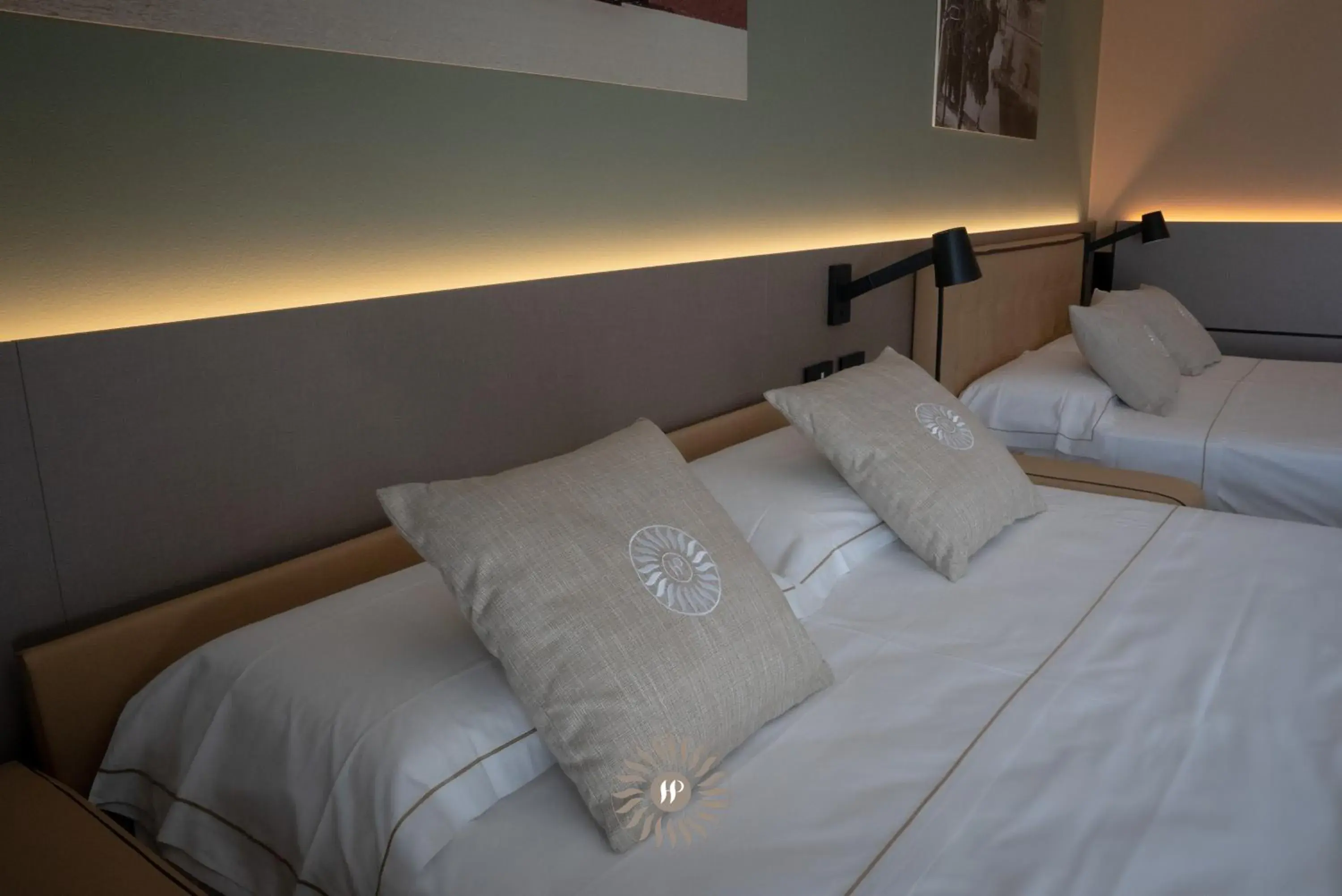 Superior Quadruple Room With Balcony and Partial Lake View in Hotel Puccini Superior Quadruple Room With Balcony and Partial Lake View in Hotel Puccini