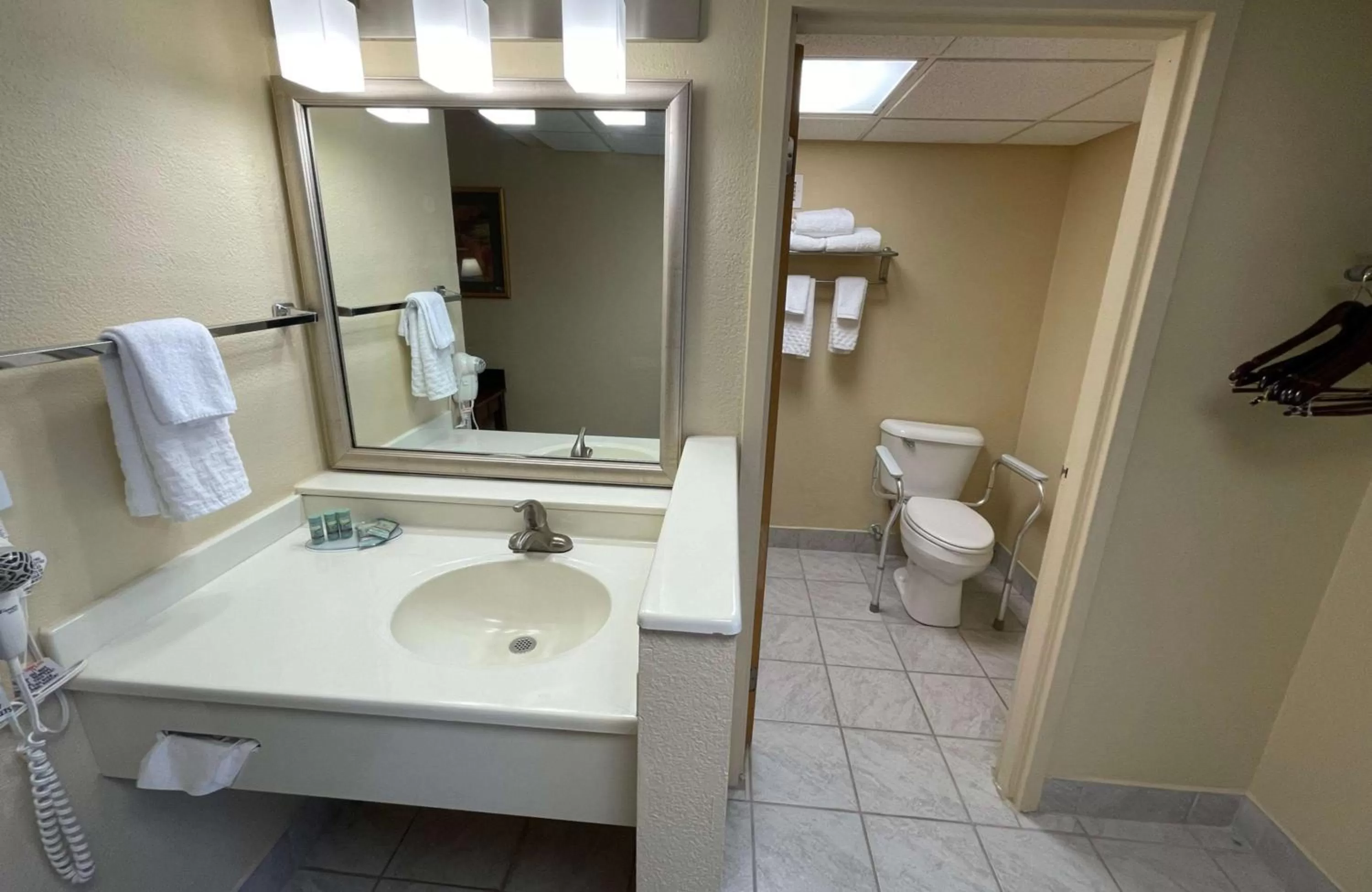 Bathroom in Crossroads Hotel & Event Center