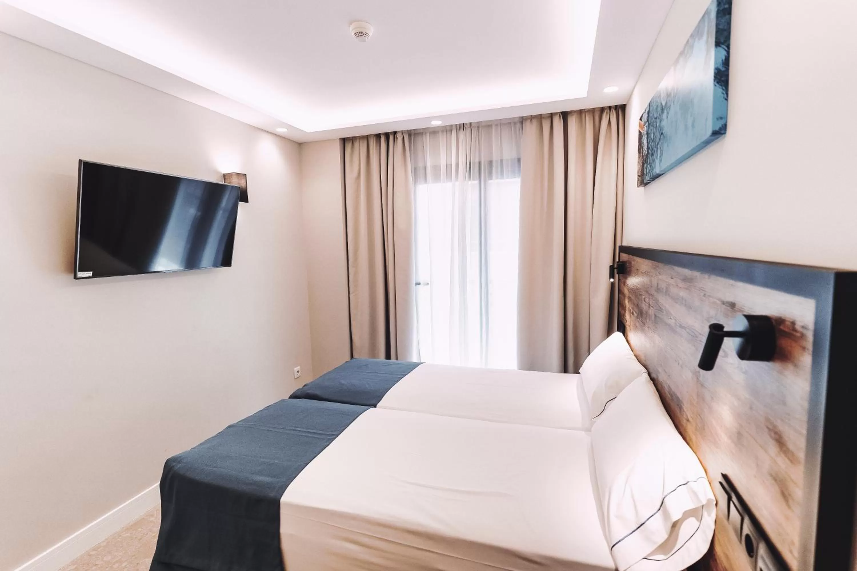 Bed in Posidonia Aparthotel