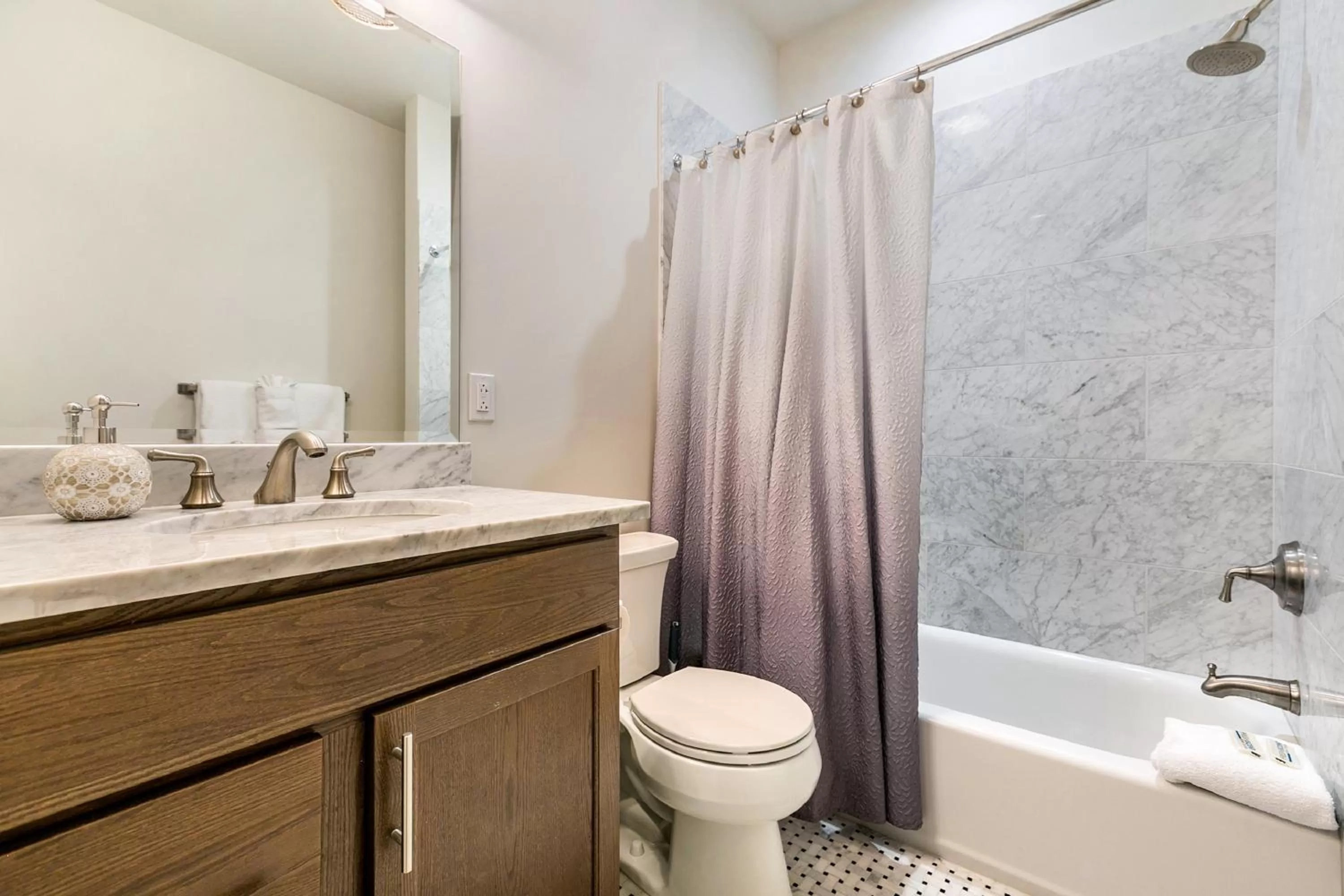 Bathroom in 1 and 2 BR Private Condos Steps Away From French Quarter