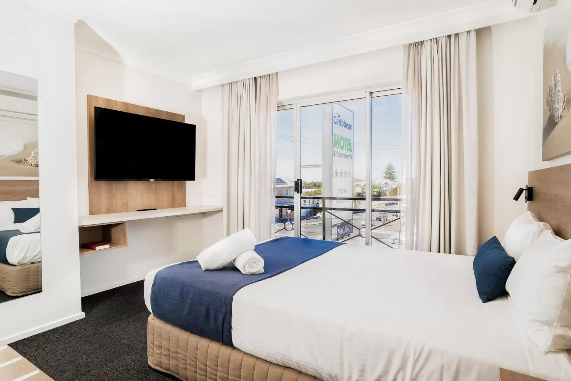 Bed in Caribbean Motel