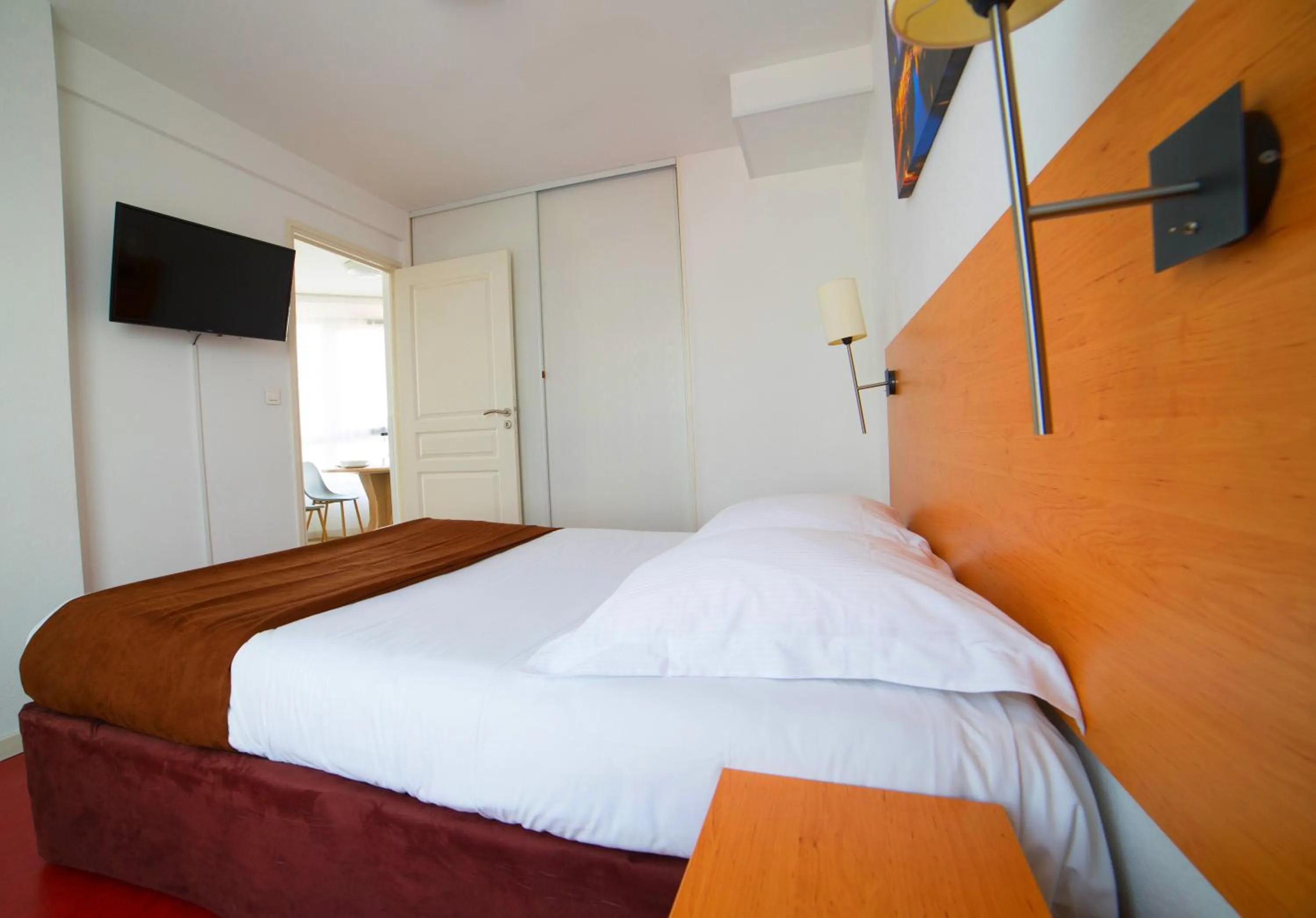 Photo of the whole room, Bed in Cerise Strasbourg Appart Hotel