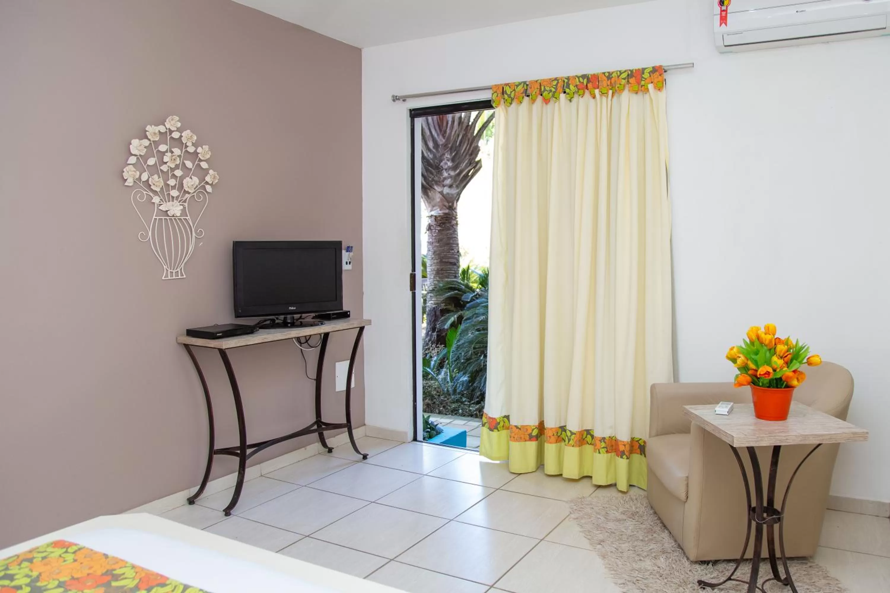 TV/Entertainment Center in Hospedaria Entre Amigos