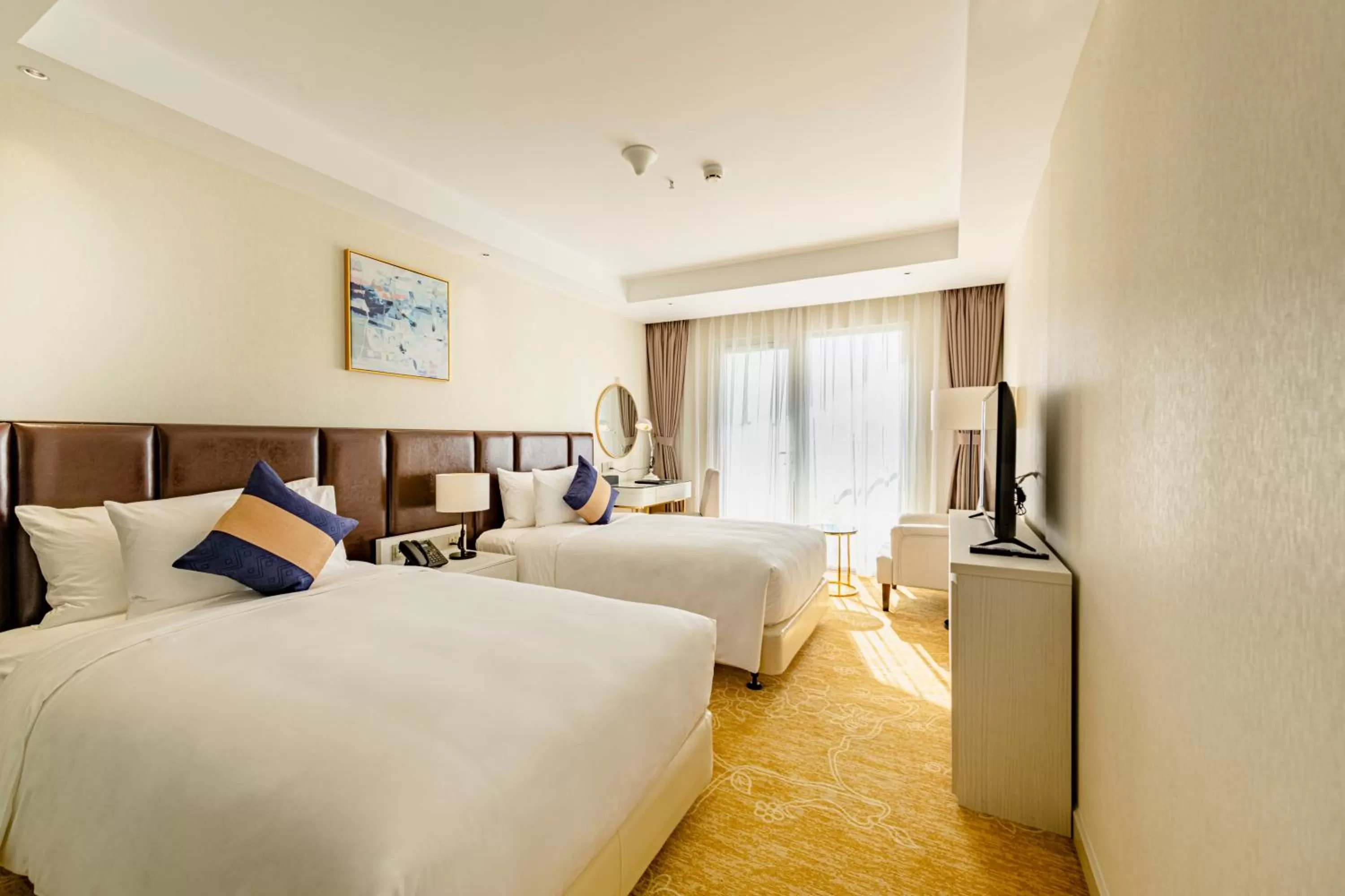 Property building, Bed in La Vela Saigon Hotel