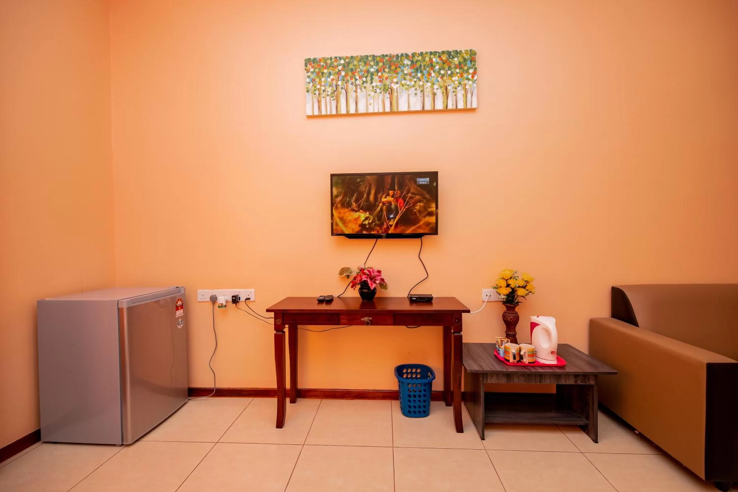 Communal lounge/ TV room in D’ Village Cottage