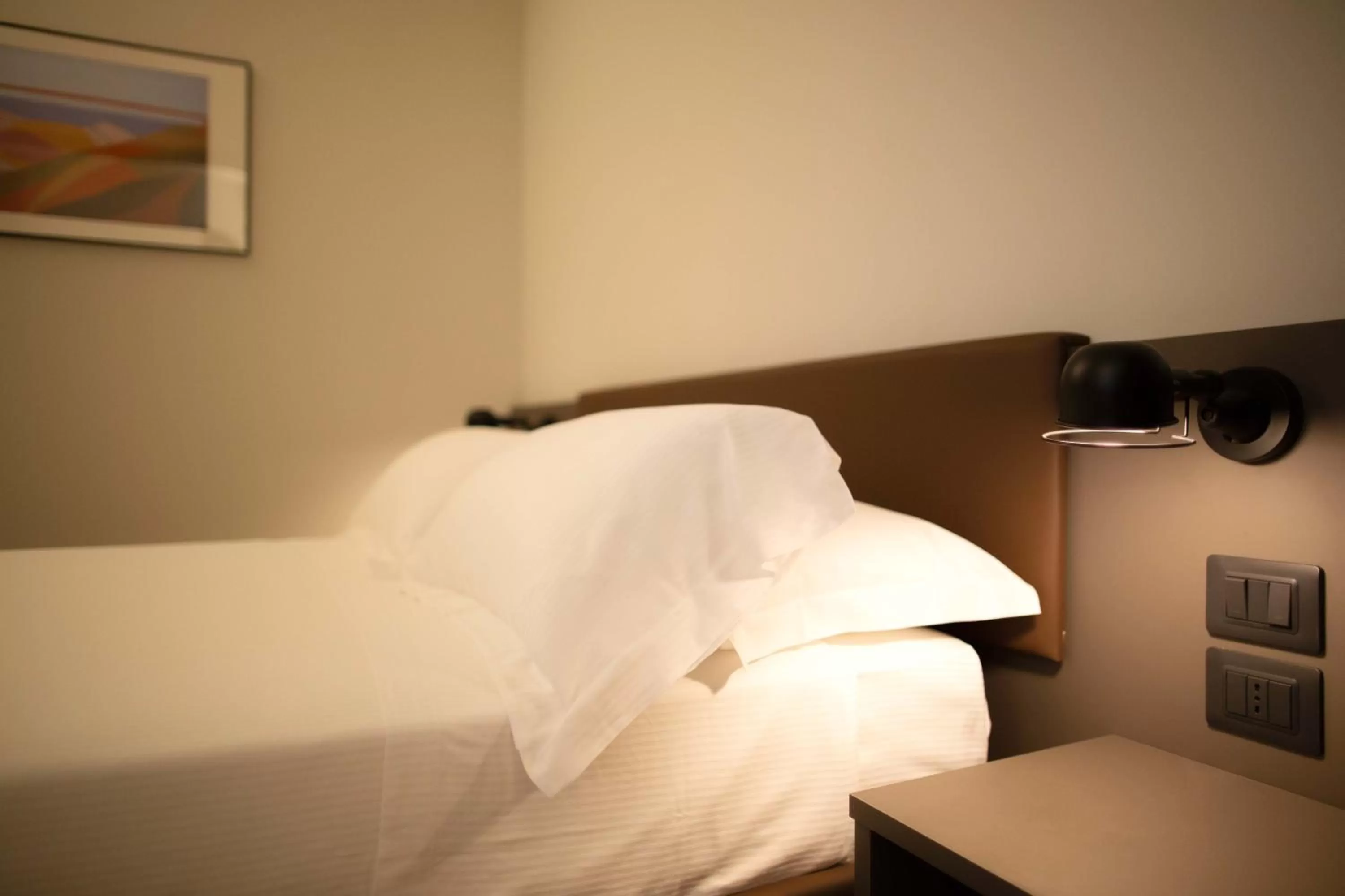 Bed in Palazzo Bellocchi - Suites & Apartments