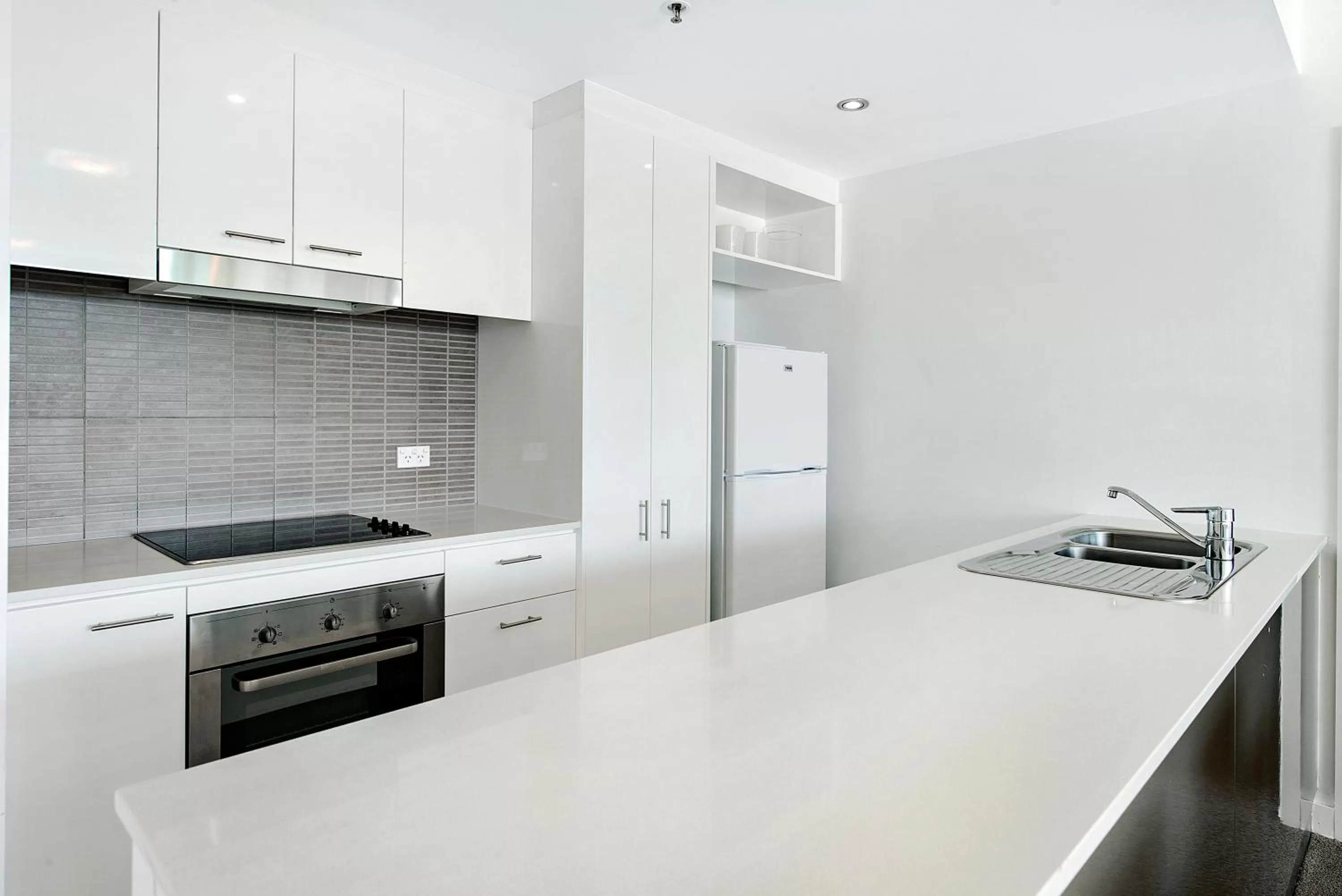 kitchen in ULTIQA Freshwater Point Resort Broadbeach