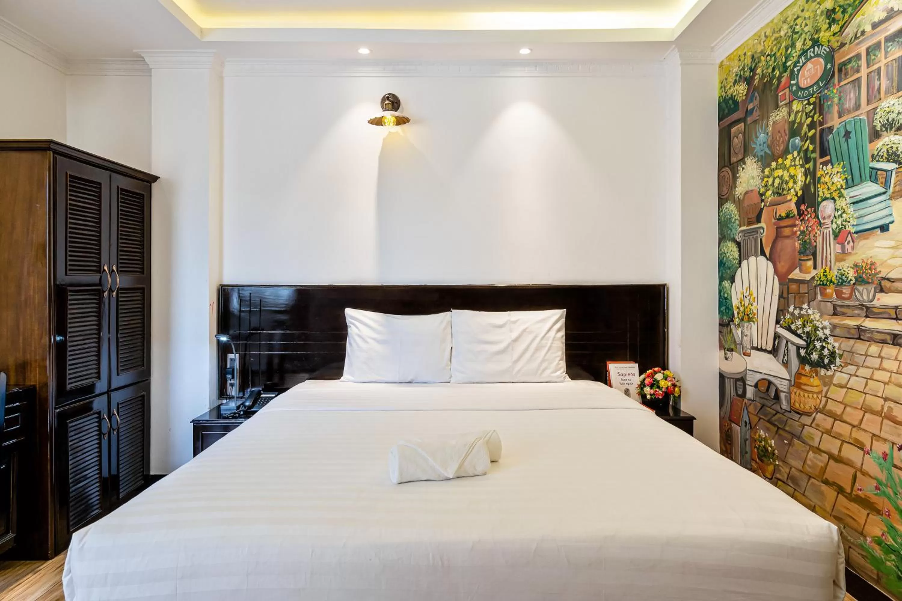 Bed in Lotus Laverne Hotel