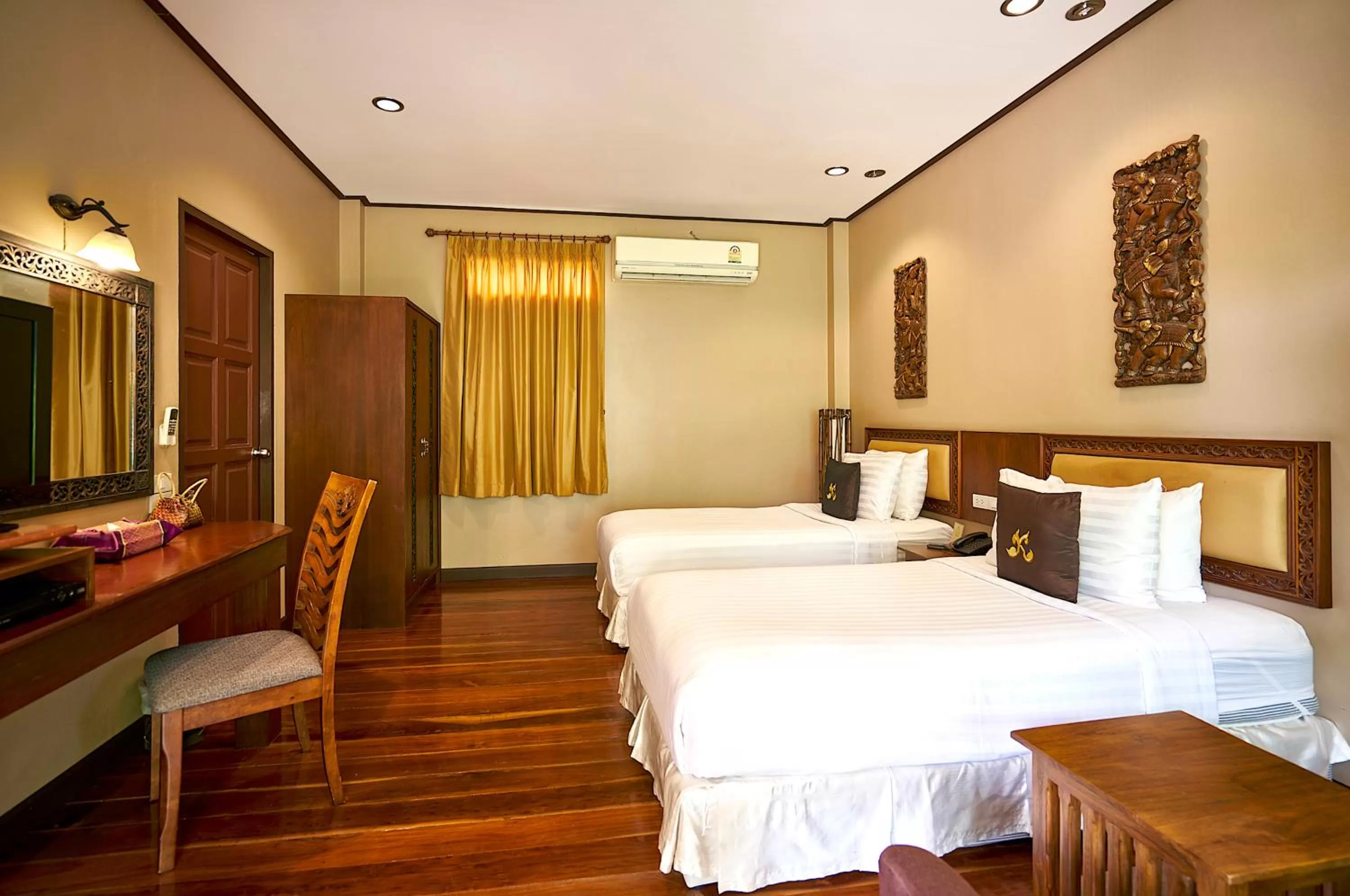 Bed in Ruenkanok Thaihouse Resort