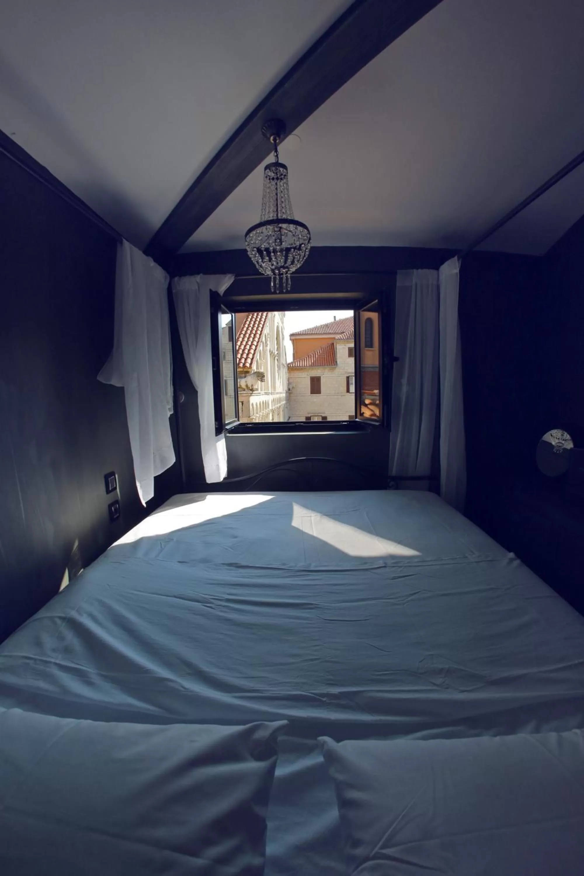 Bed in Central Apartments Integrated Hotel