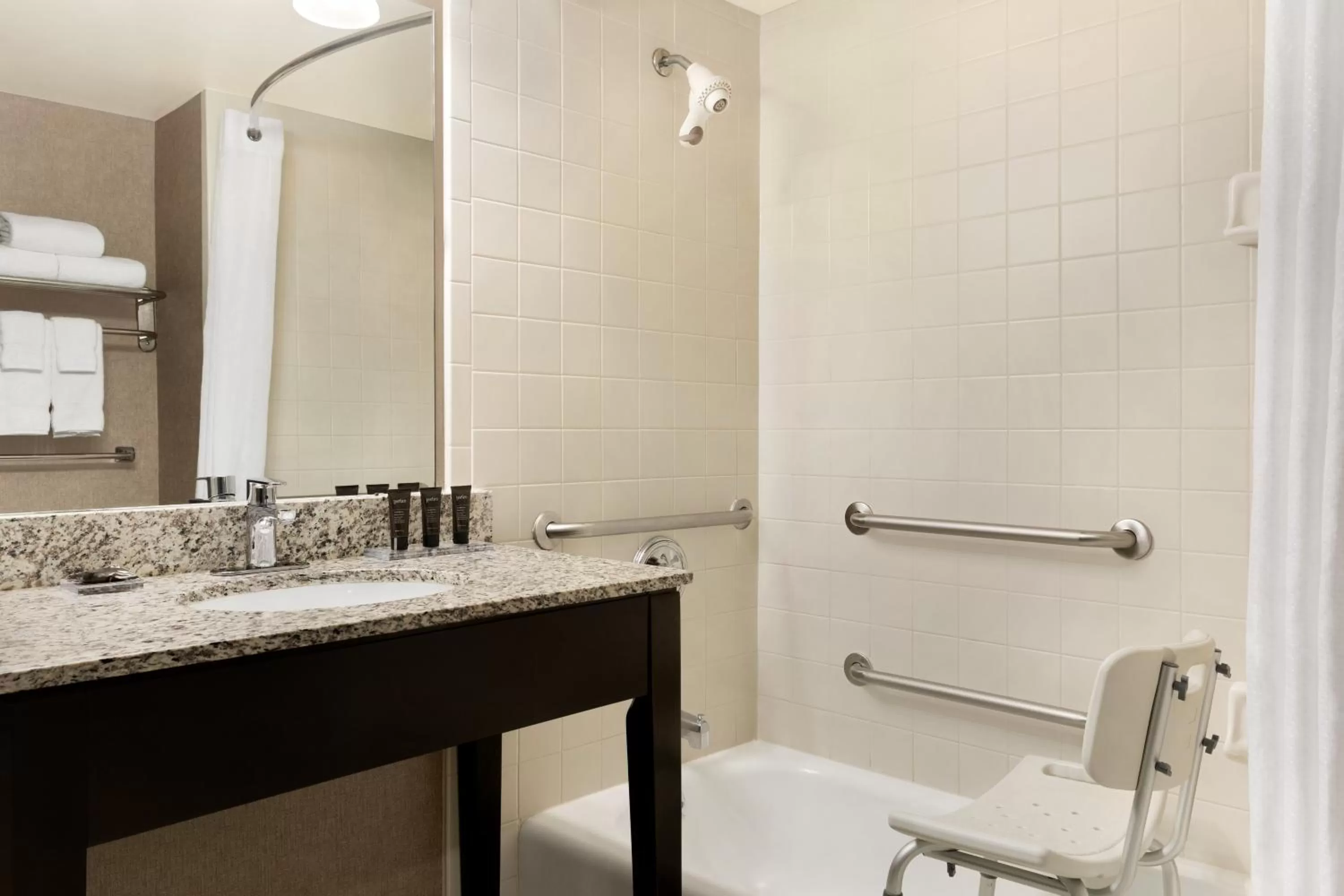 Bathroom in Wingate by Wyndham Cincinnati Blue Ash