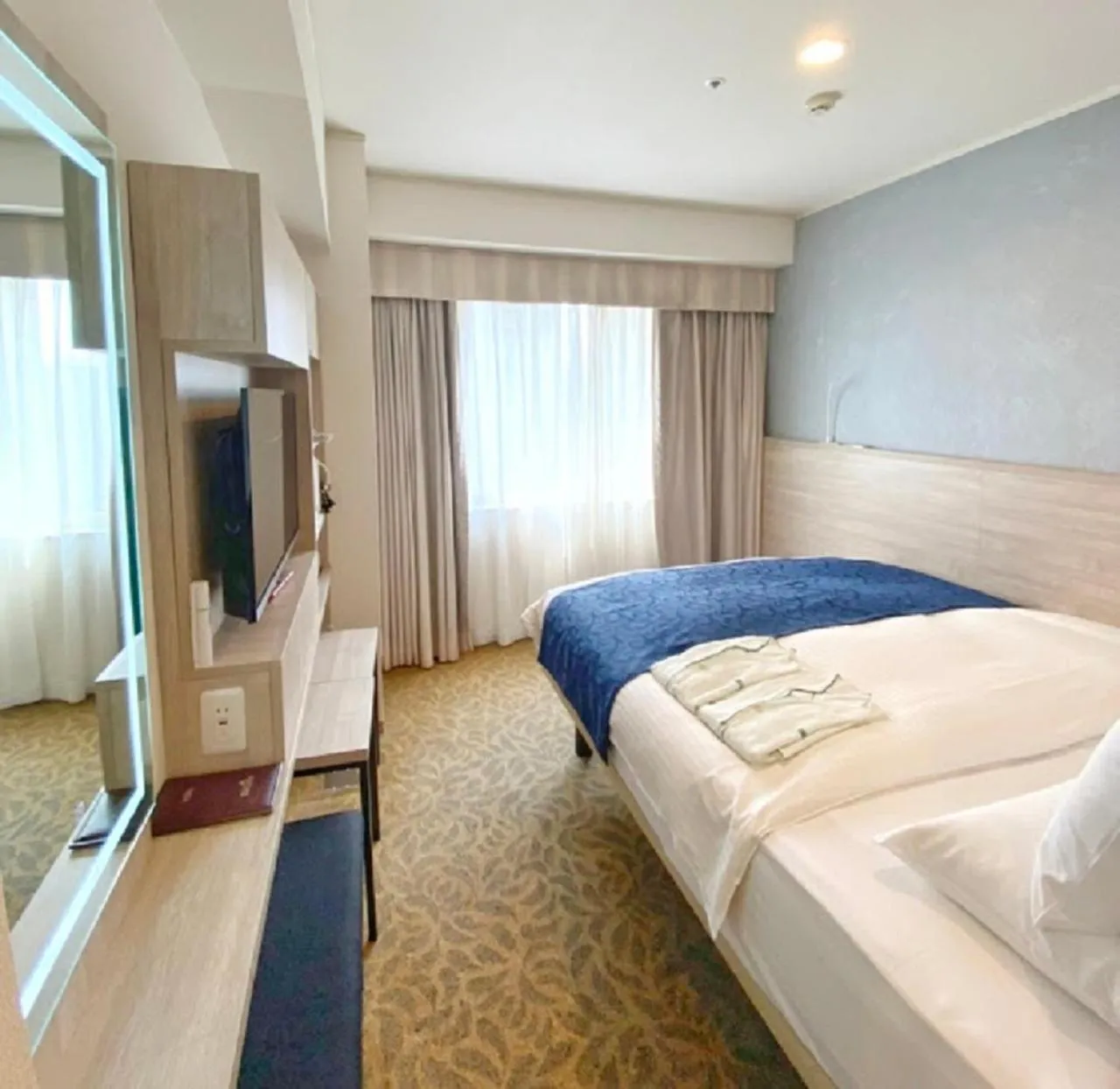 Bed in Hotel Rose Garden Shinjuku