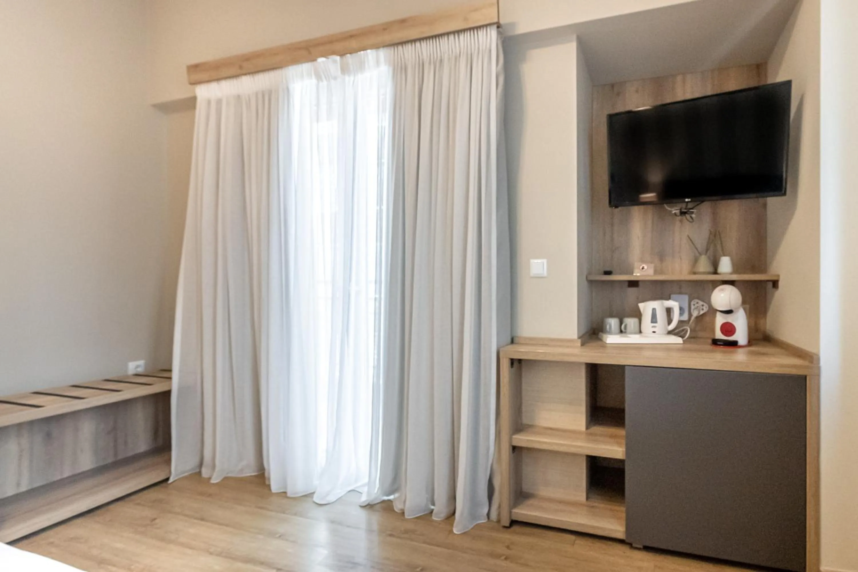 Bed in Hotel @Syngrou Fix